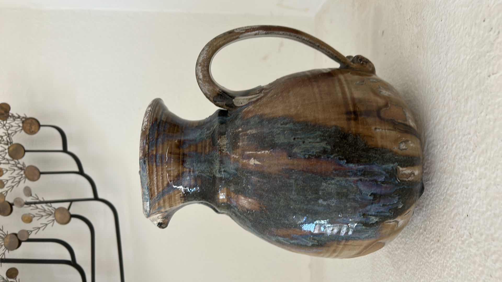 Photo 2 of SIGNED GLAZED POTTERY - PITCHER 9.5 inches.