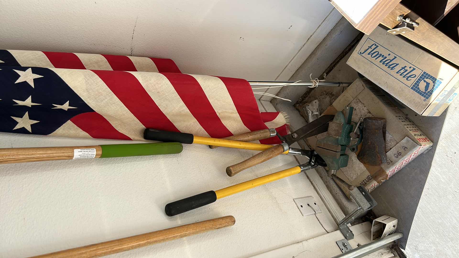 Photo 2 of AMERICAN FLAG, GARDEN TOOLS, VICE, SAW AND MORE