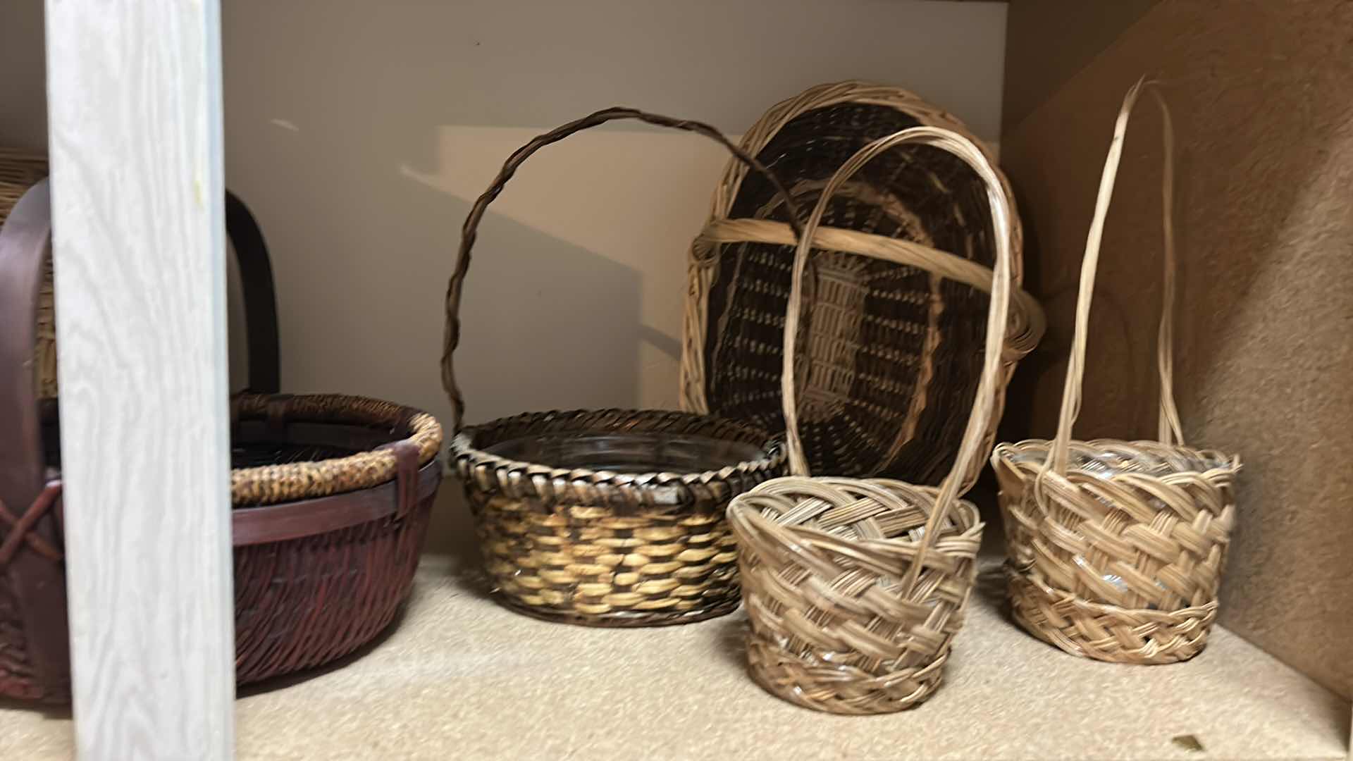 Photo 3 of SHELVES IN GARAGE - WICKER BASKETS