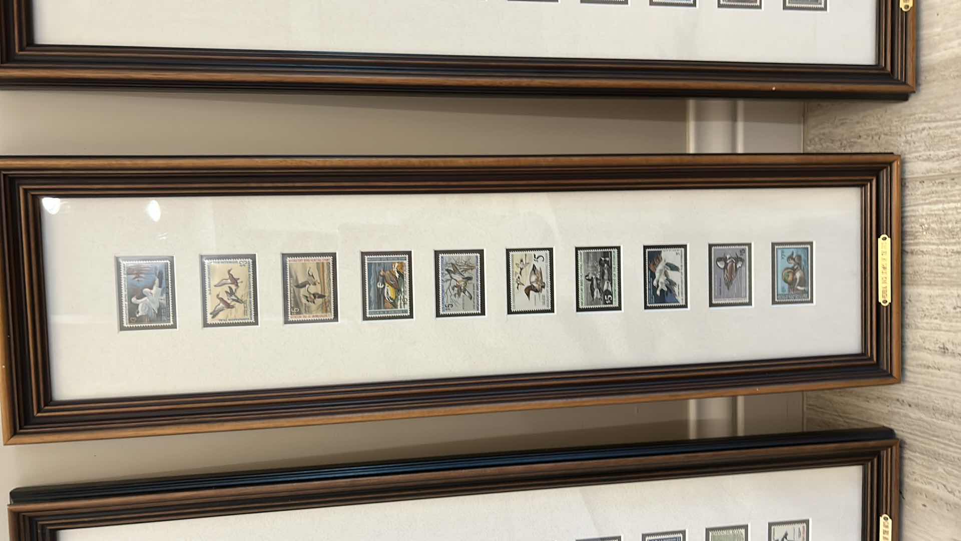 Photo 3 of 40 DUCK STAMPS, 1960’s - 1990’s and HARDCOVER DUCK STAMP COFFEE TABLE BOOK, FRAMED BY DECADE ARTWORK 9“ x 29 1/2“