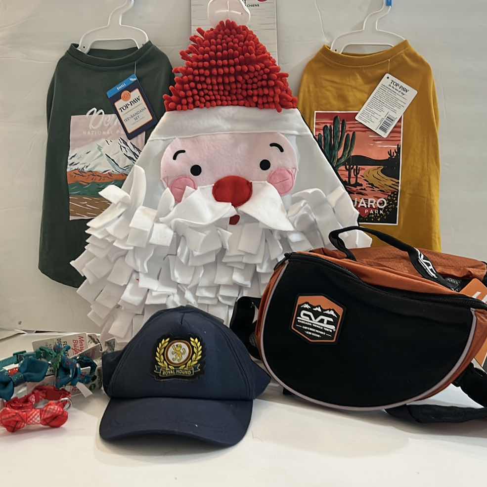 Photo 1 of NEW SMALL DOG ASSORTMENT, 1 BACKPACK/SADDLE BAG, 2 TOP PAW TEE SHIRTS, 4 COLLARS, 1 TOP PAW DOG HAT AND A SNUFFLE MAT