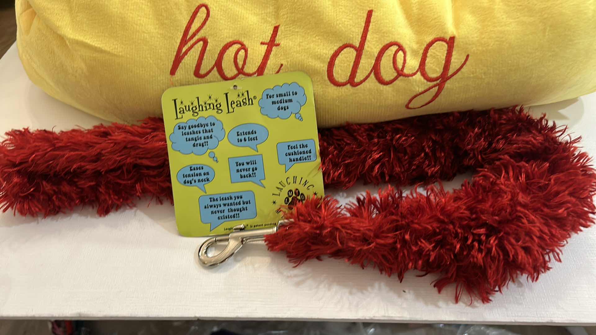 Photo 2 of NEW SMALL DOG ASSORTMENT- ALPHA PAW “HOT DOG BED”, LAUGHING LEASH AND DRESS