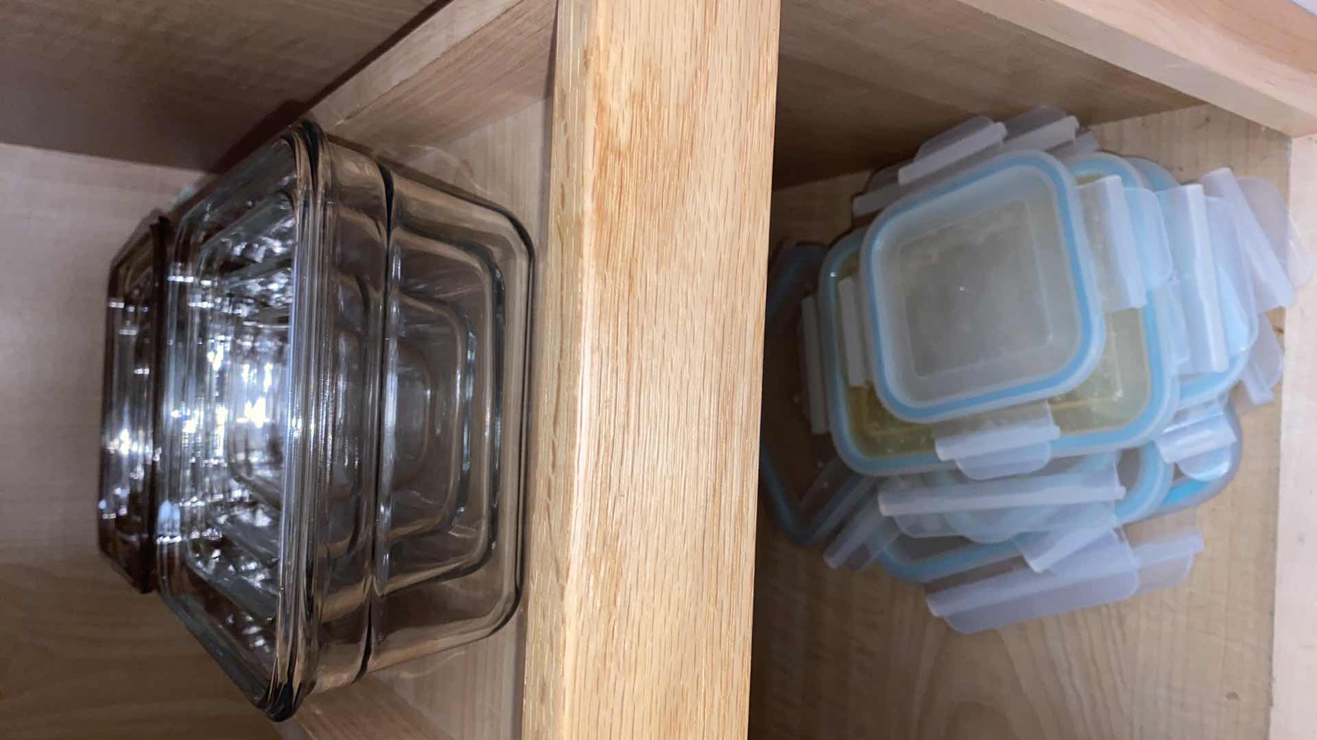 Photo 1 of CONTENTS OF CABINET GLASS STORAGE CONTAINERS ANSWER LIDS