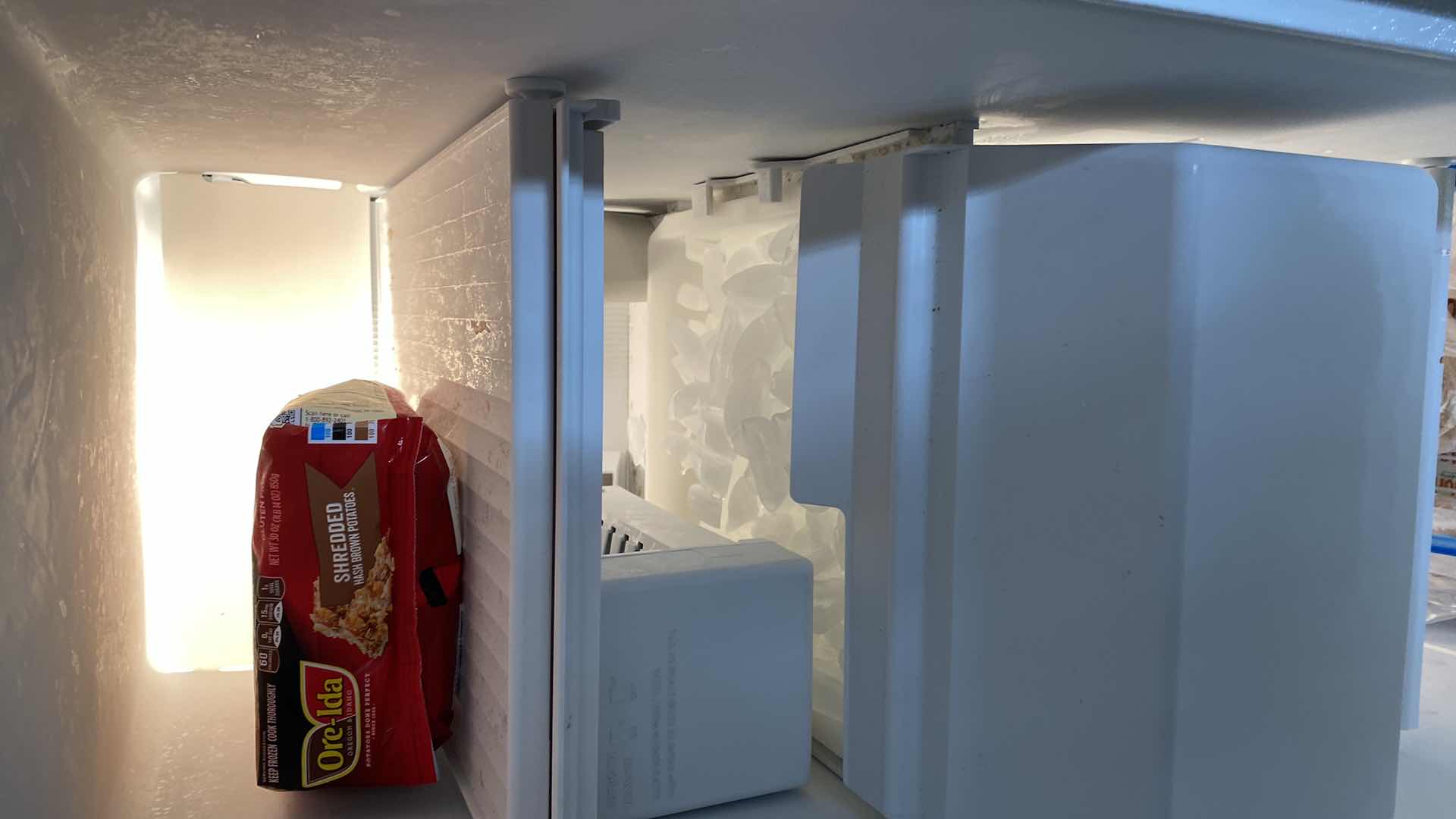 Photo 4 of KENMORE WHITE SIDE BY SIDE REFRIGERATOR WITH ICE MAKER
