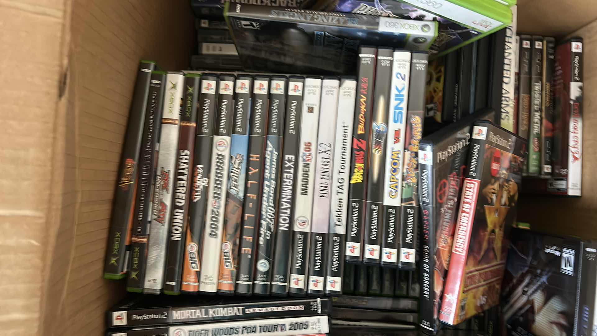 Photo 2 of LARGE BOX FILLED WITH XBOX AND PLAY STATION GAMES