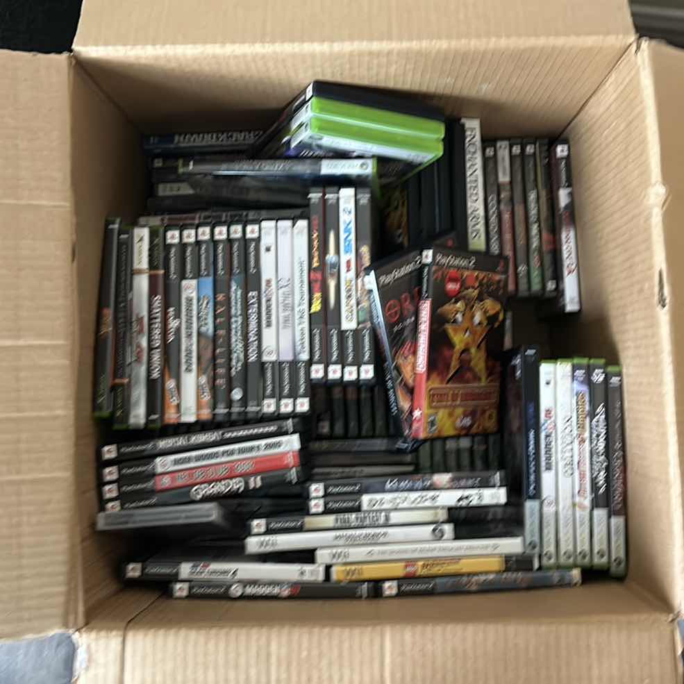 Photo 1 of LARGE BOX FILLED WITH XBOX AND PLAY STATION GAMES