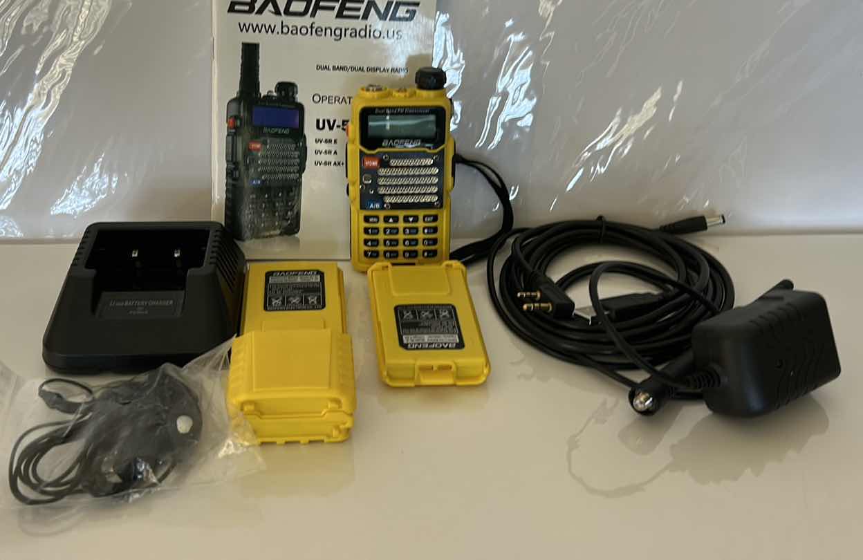 Photo 1 of BAOFENG DUAL BAND RADIO WITH ACCESSORIES