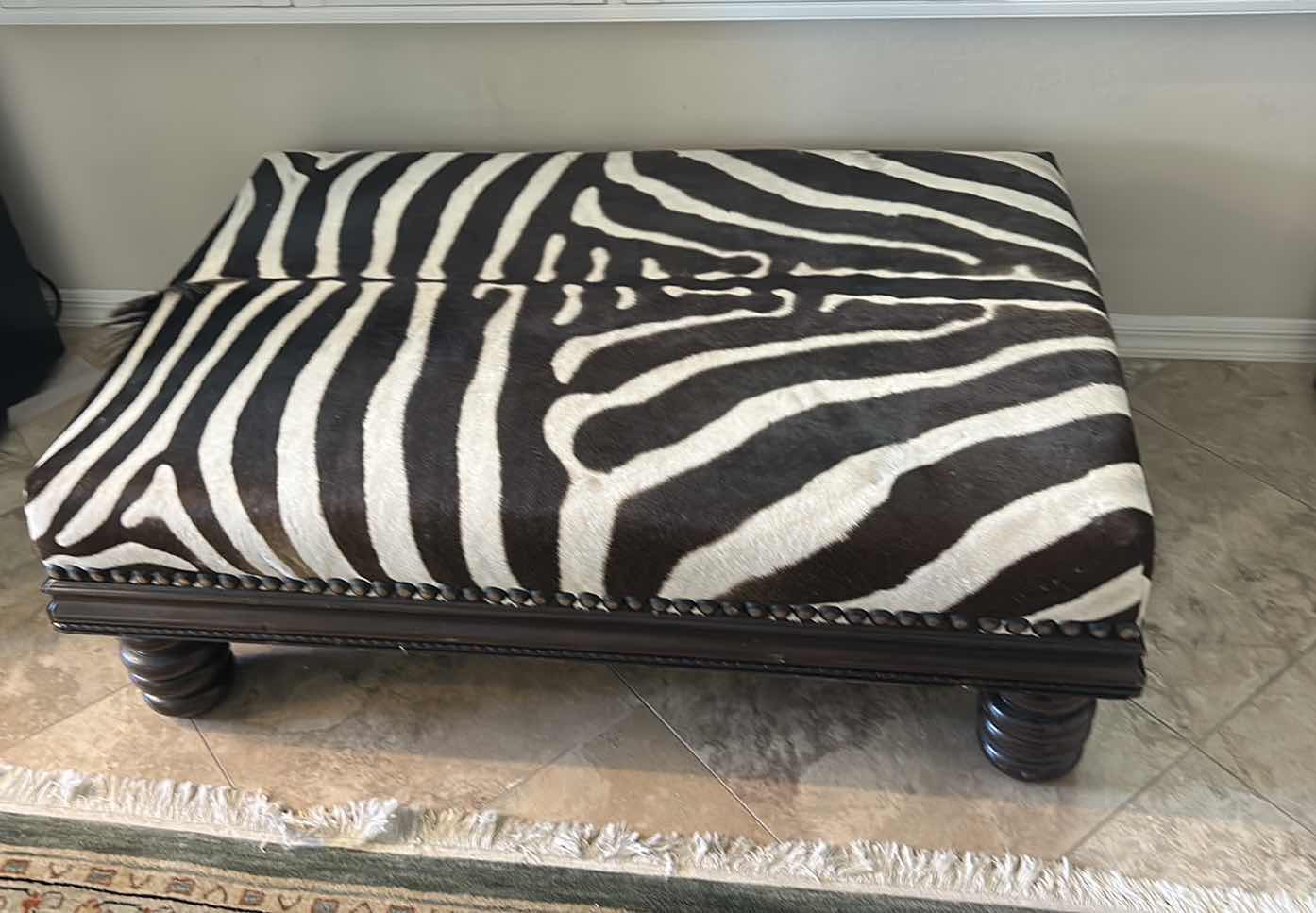 Photo 1 of REAL ZEBRA OTTOMAN/COCKTAIL TABLE 49” x 32” x 17”