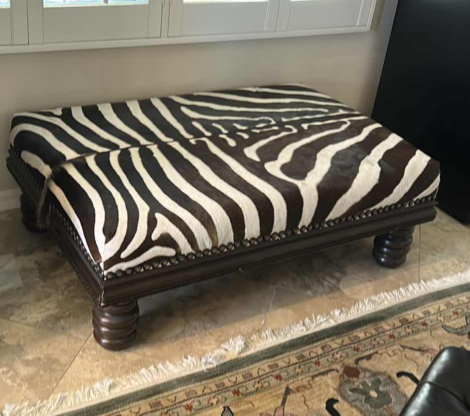Photo 2 of REAL ZEBRA OTTOMAN/COCKTAIL TABLE 49” x 32” x 17”