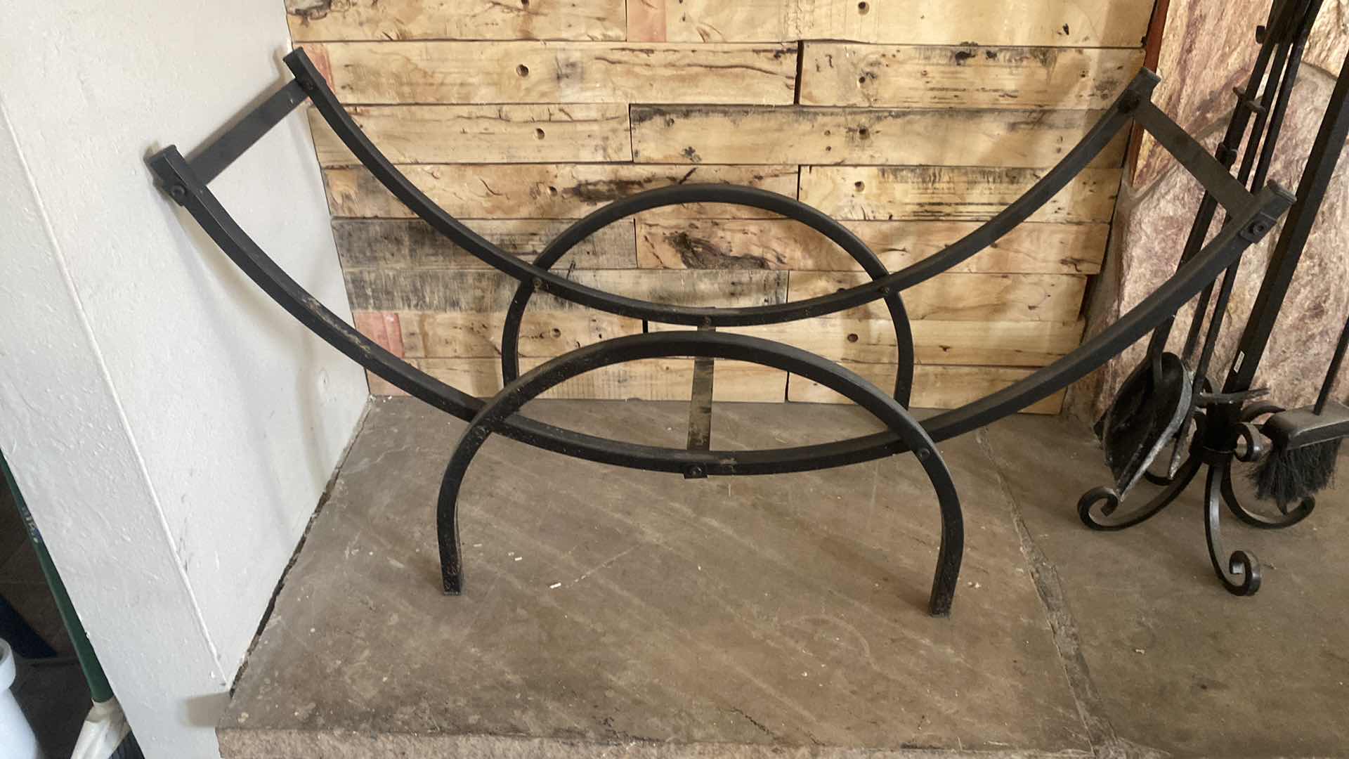 Photo 2 of BLACK METAL LOG HOLDER 39” x 14” H21 “AND FIREPLACE TOOLS