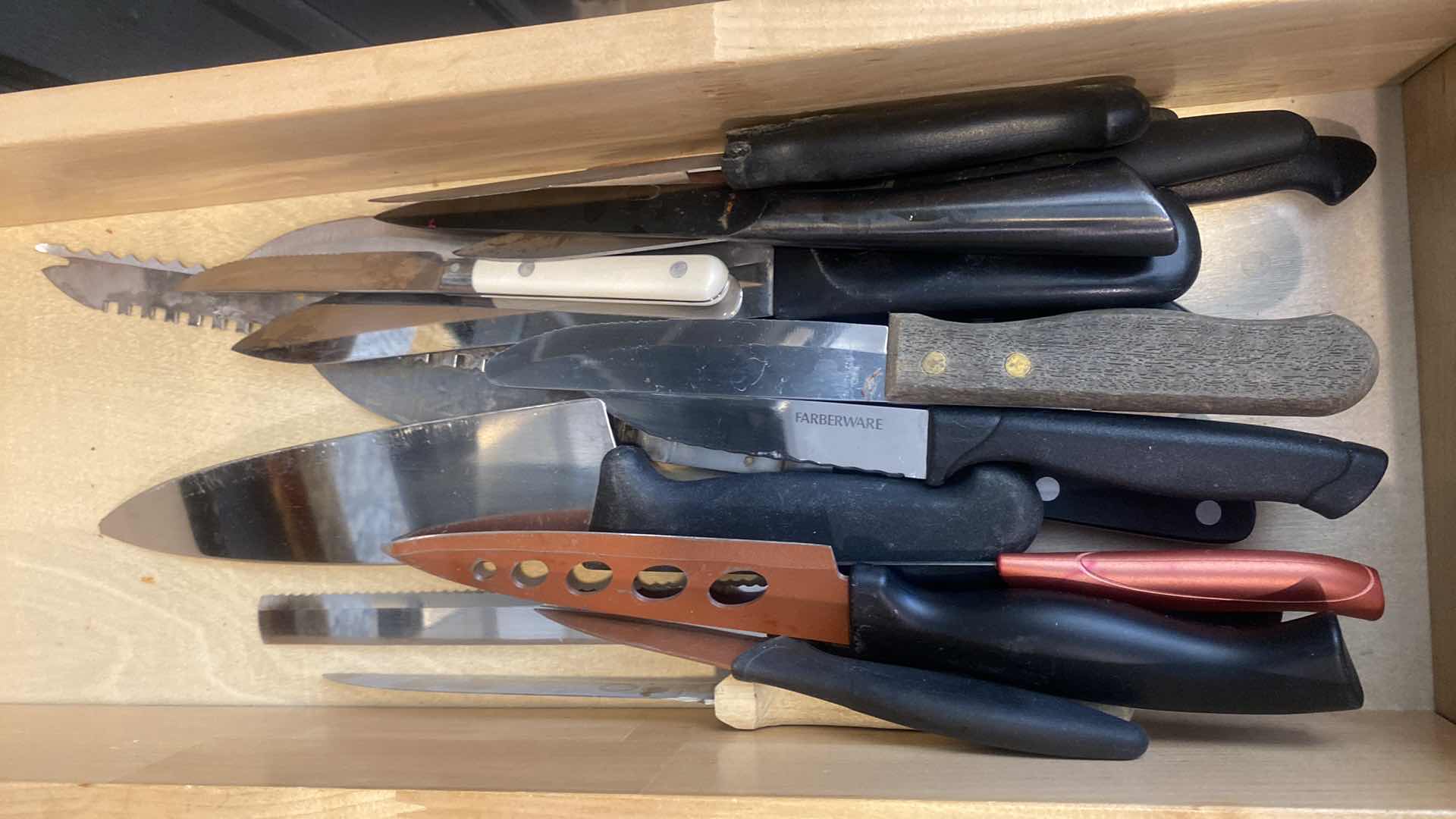 Photo 1 of CONTENTS KITCHEN CABINET-DRAWER OF KNIFES