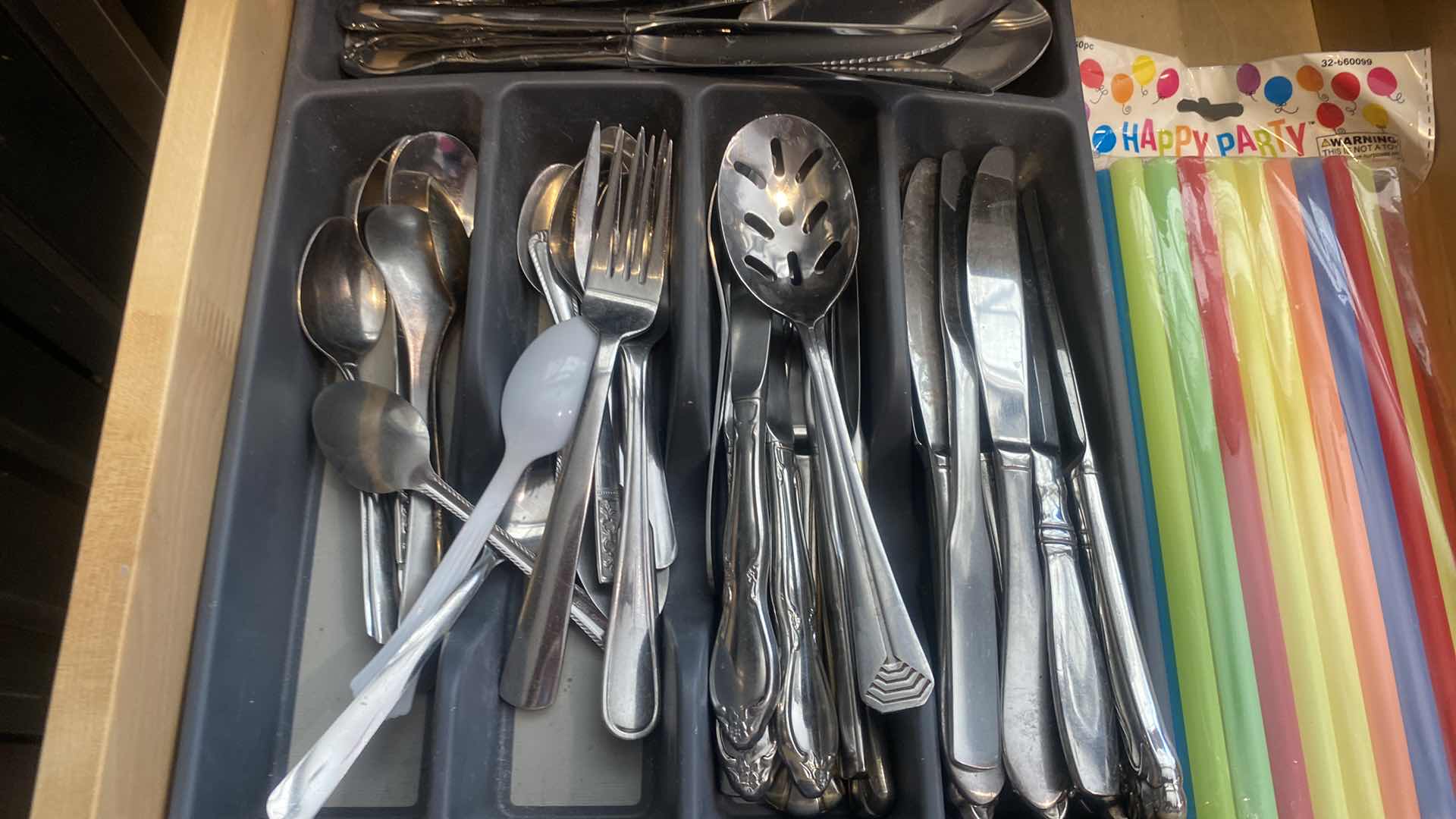 Photo 2 of CONTENTS KITCHEN CABINET-DRAWER WITH SILVERWARE & STRAWS