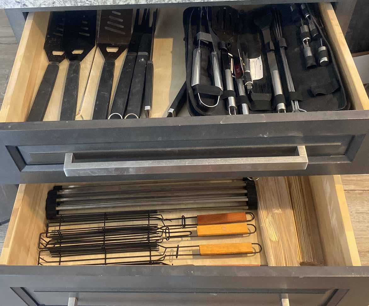 Photo 1 of CONTENTS KITCHEN CABINET-2 DRAWERS BBQ TOOLS