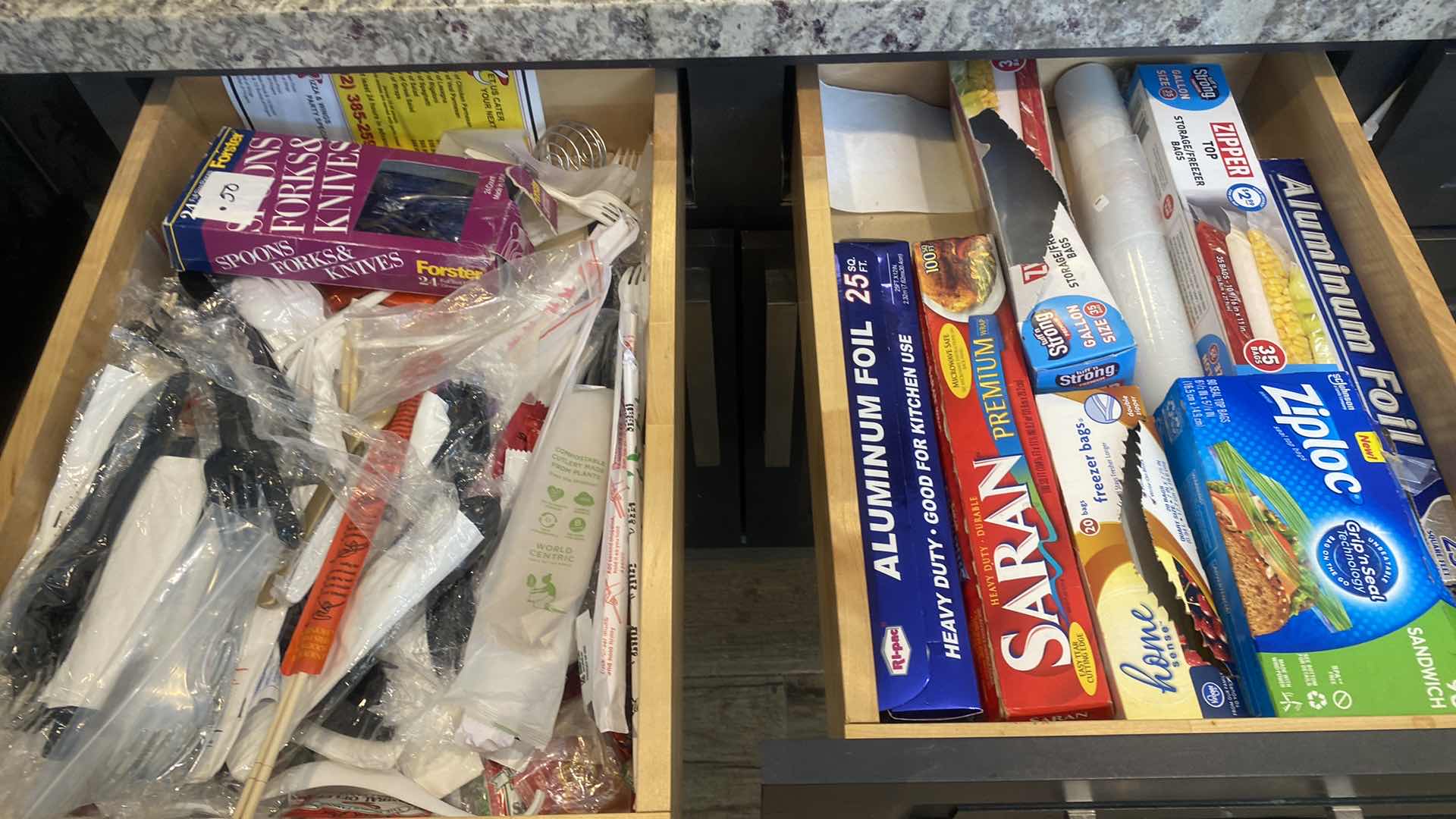 Photo 1 of CONTENTS KITCHEN CABINET-2 DRAWERS PLASTIC SILVERWARE & STORAGE BAGS & WRAPS