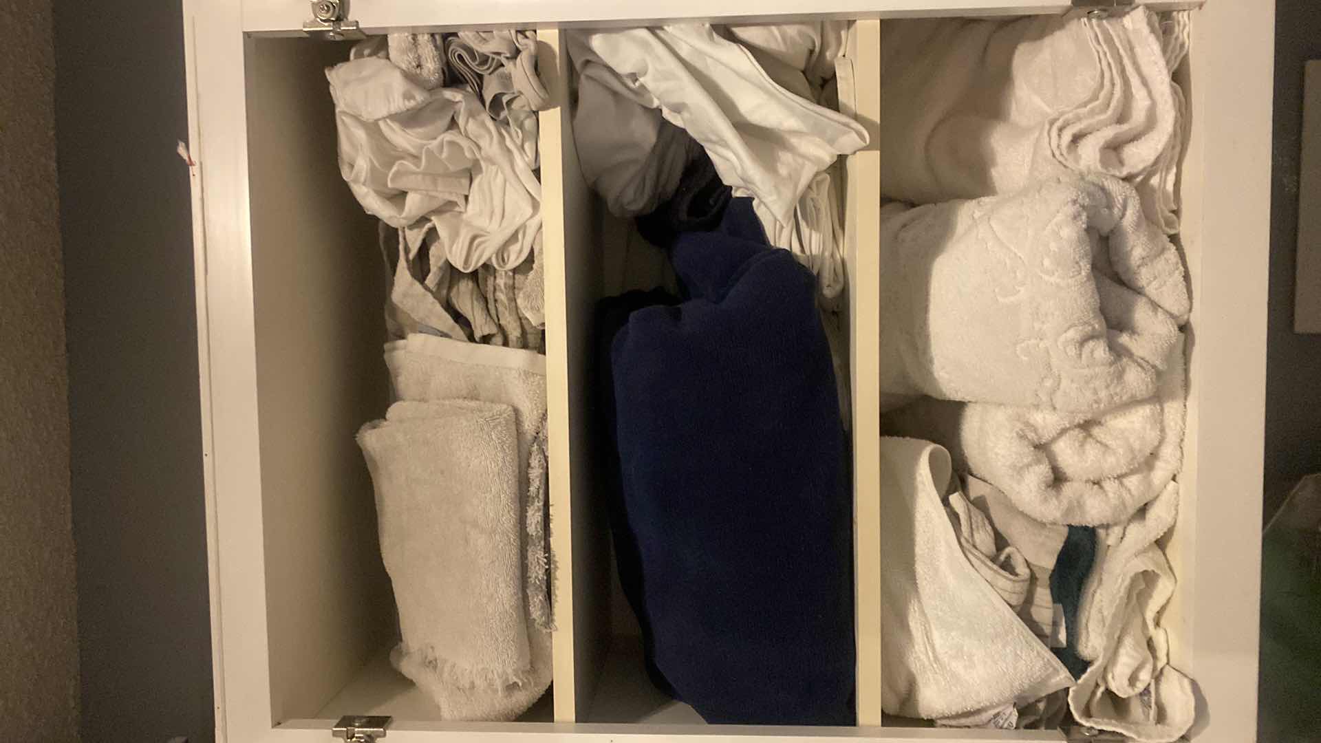 Photo 2 of CONTENTS OF 2 LAUNDRY ROOM CABINETS - TOWELS & SHEETS