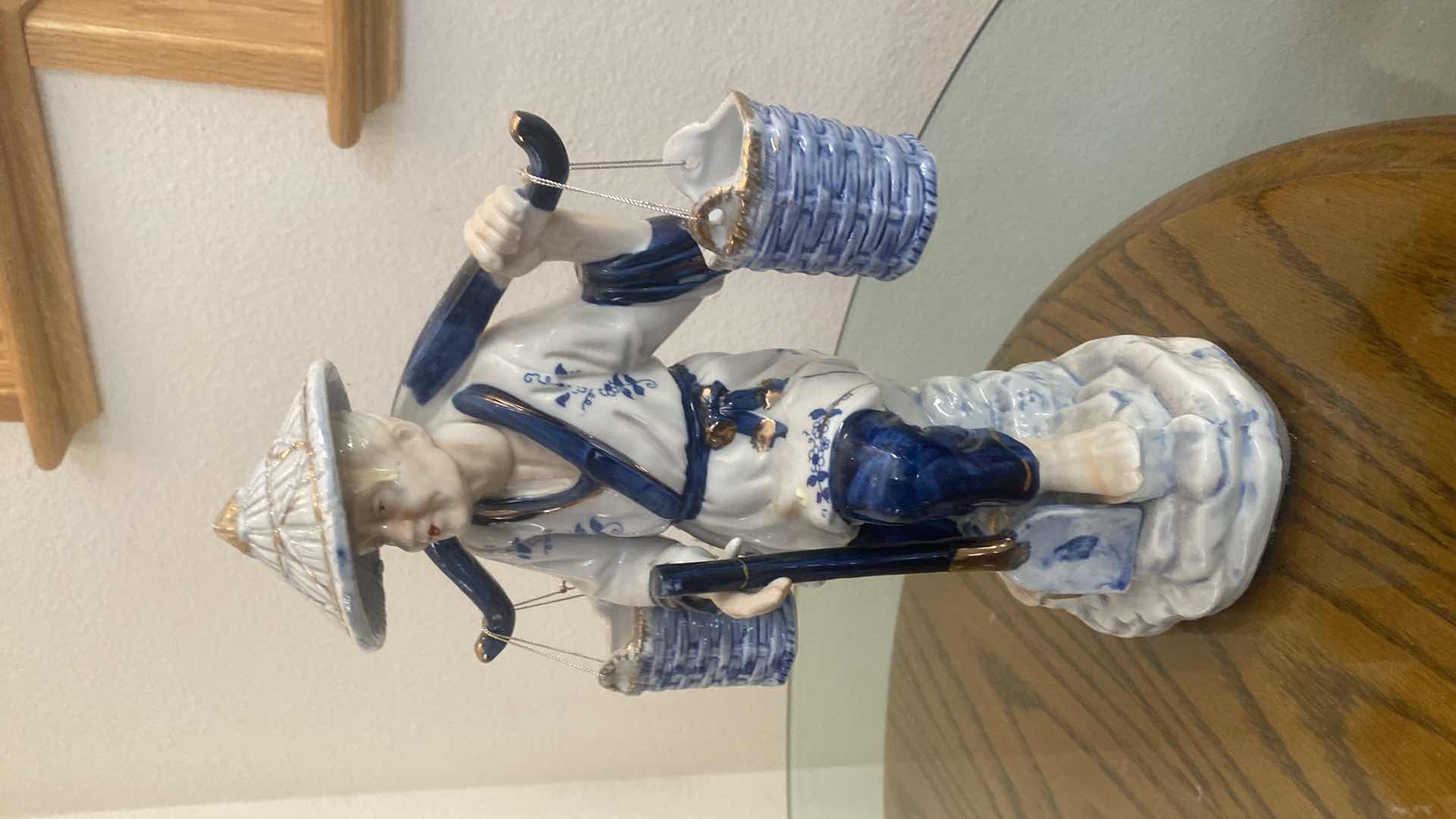 Photo 1 of BLUE & WHITE PORCELAIN W GOLD GILT CHINESE MAN WITH WATER BUCKETS H13”