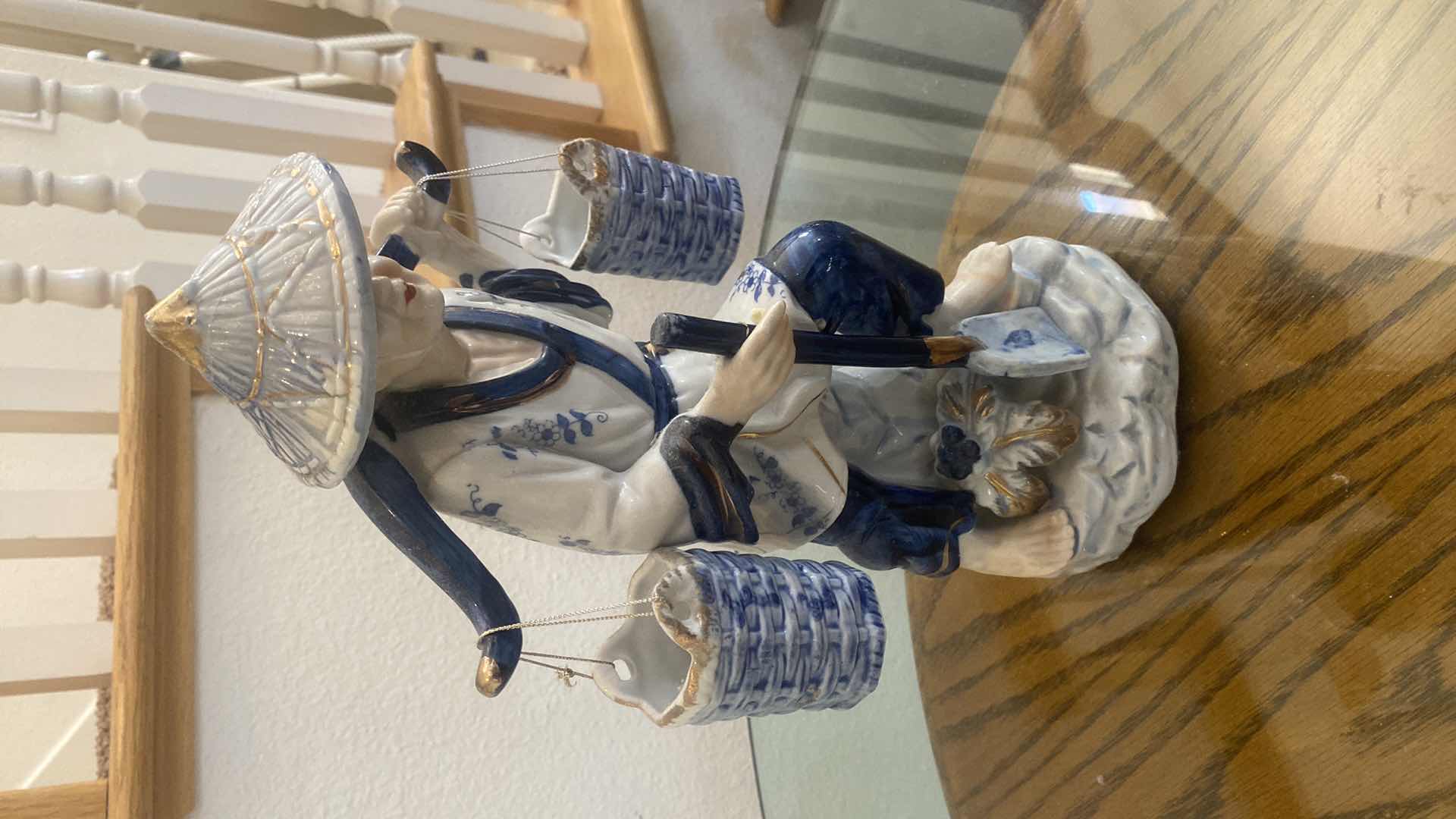 Photo 1 of BLUE & WHITE PORCELAIN W GOLD GILT CHINESE MAN WITH WATER BUCKETS H13”
