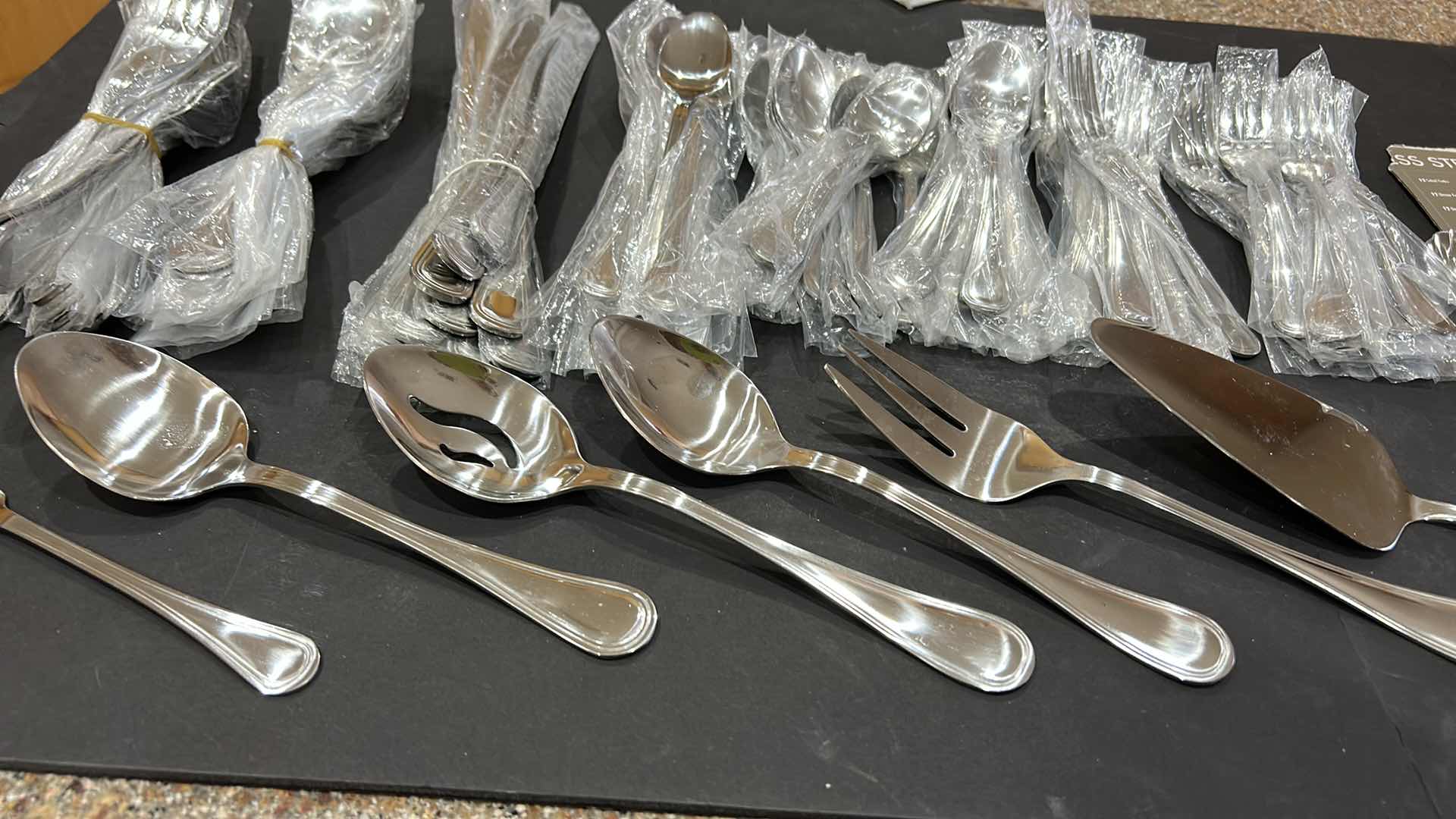 Photo 1 of 102PC NEW STAINLESS STEEL UTENSILS