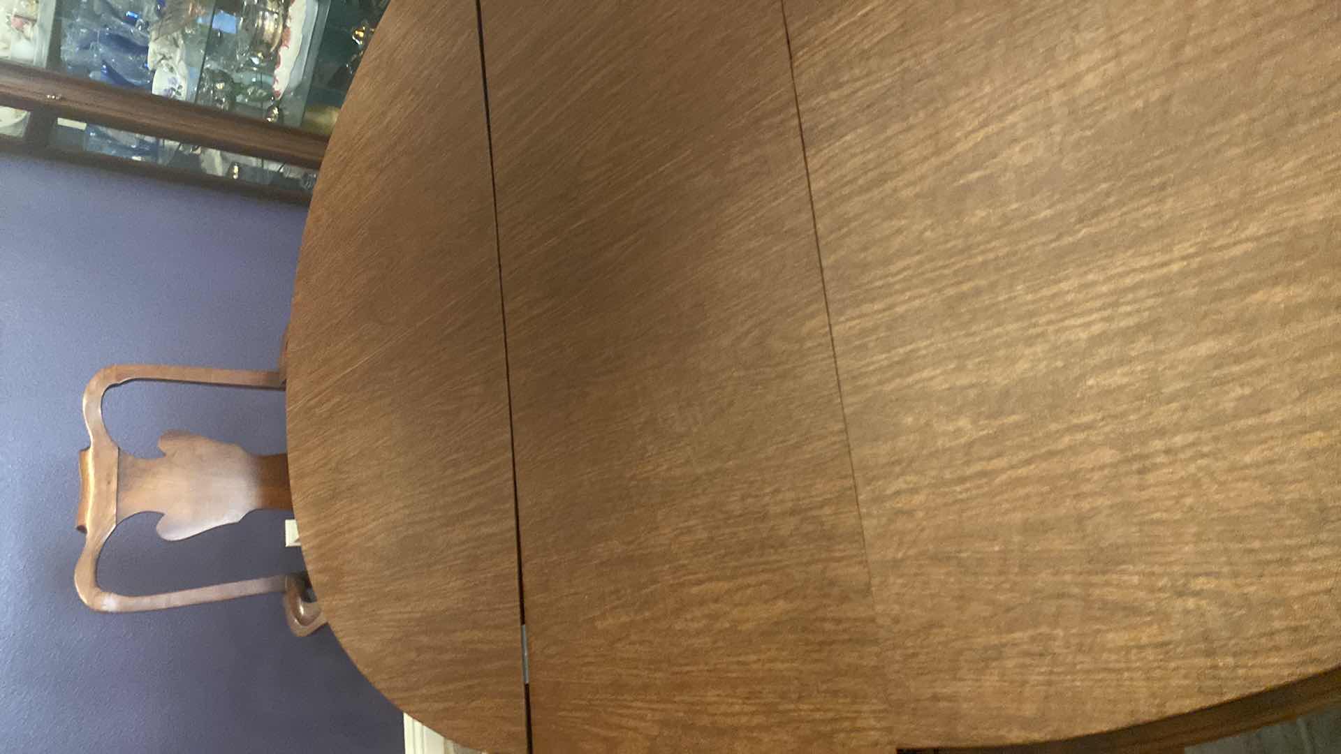 Photo 1 of WOOD DINING TABLE WITH 2 ARM CHAIRS AND 2 SIDE CHAIRS TABLE WITHOUT LEAFS 55” x 41 1/2” H29 1/2” INCLUDES 2 17 3/4” LEAFS & TABLE PAD
