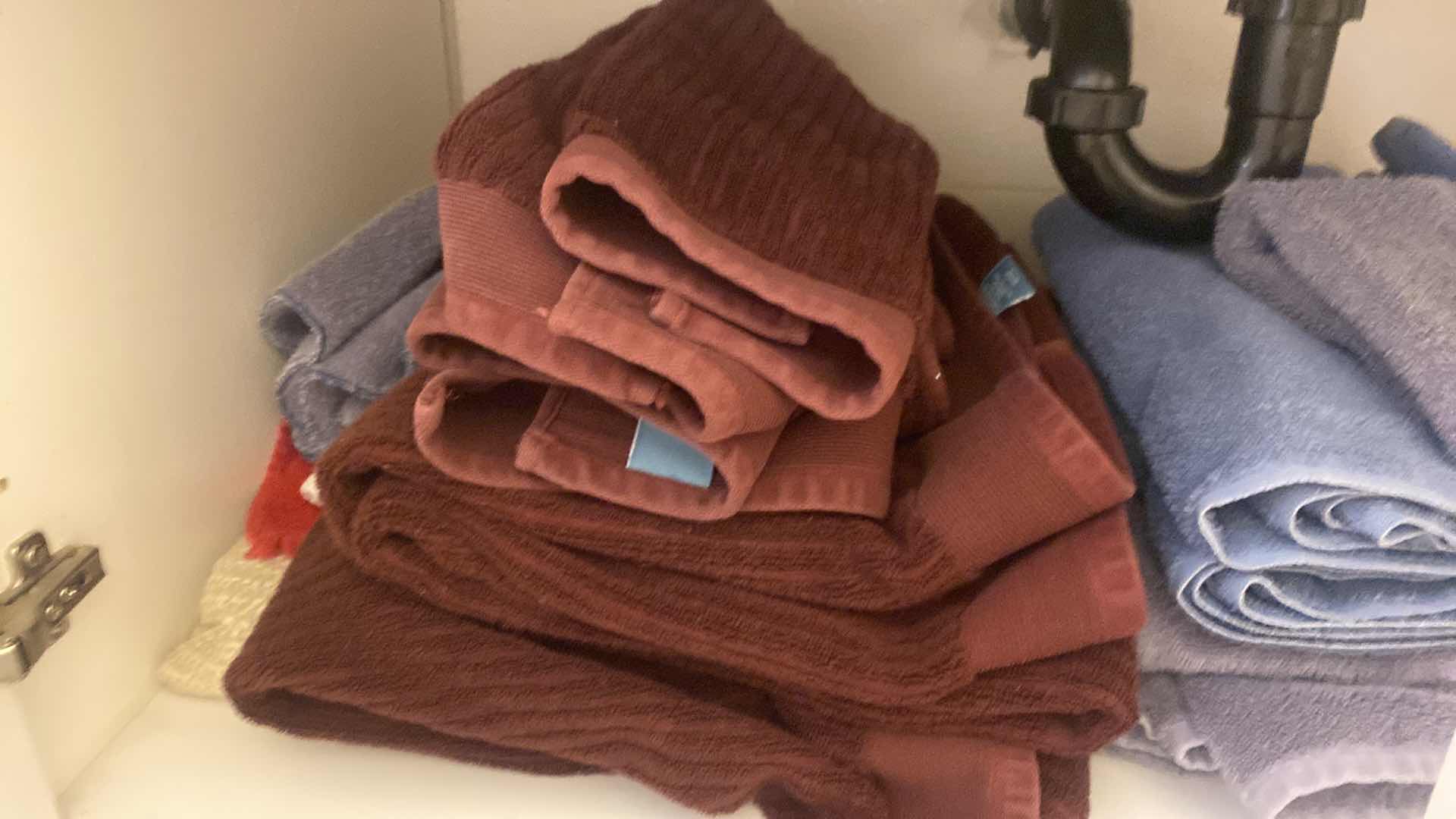 Photo 1 of CONTENTS OF CABINET - BATH TOWELS & RUG