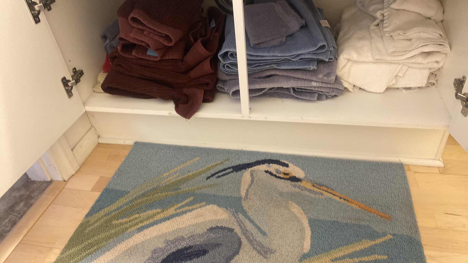 Photo 1 of CONTENTS OF CABINET - BATH TOWELS & RUG