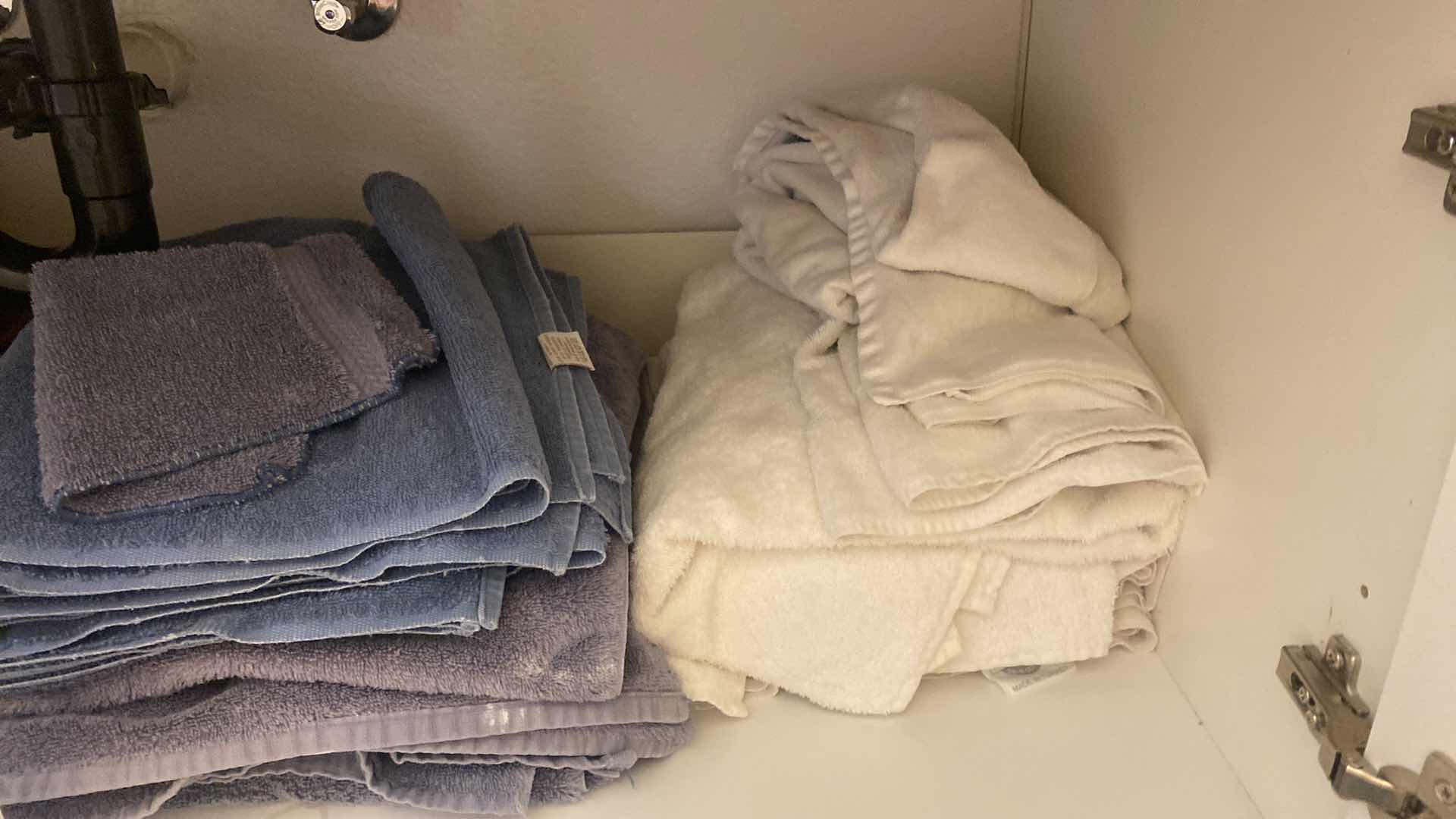 Photo 1 of CONTENTS OF CABINET - BATH TOWELS & RUG