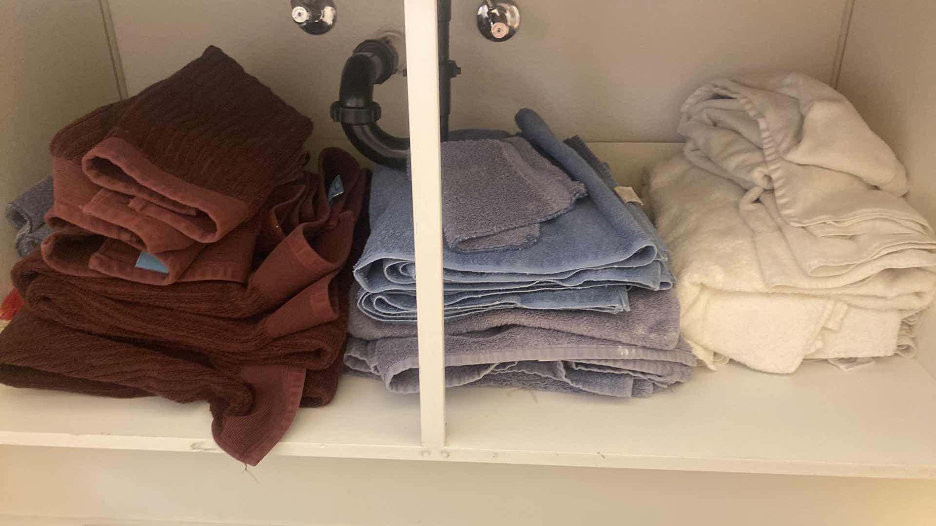 Photo 1 of CONTENTS OF CABINET - BATH TOWELS & RUG