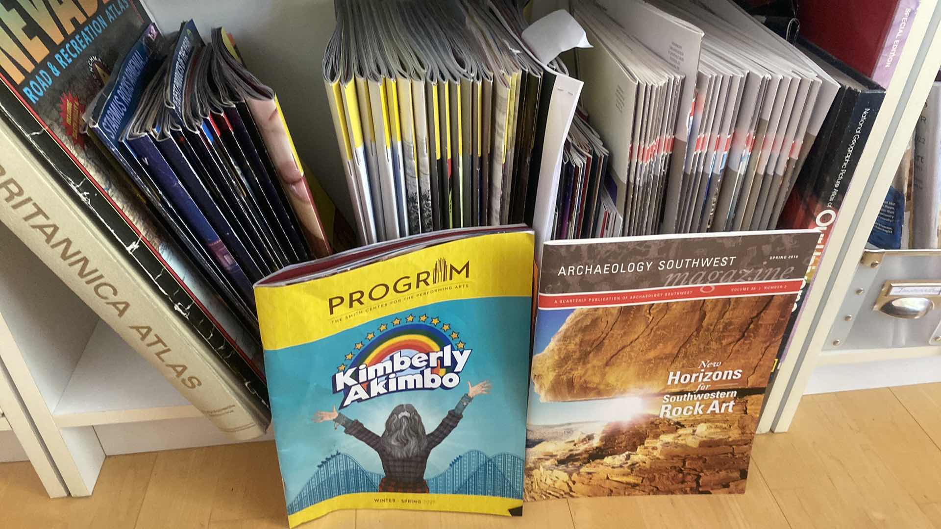 Photo 1 of SHELF OF BOOKS NEW HORIZONS & PROGRAMS