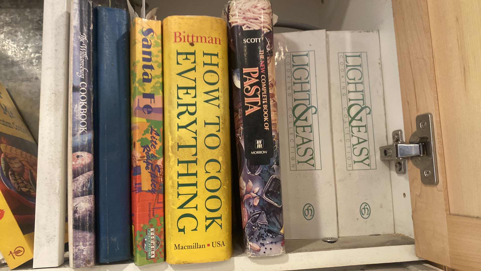 Photo 1 of CONTENTS OF KITCHEN CABINET - COOKBOOKS