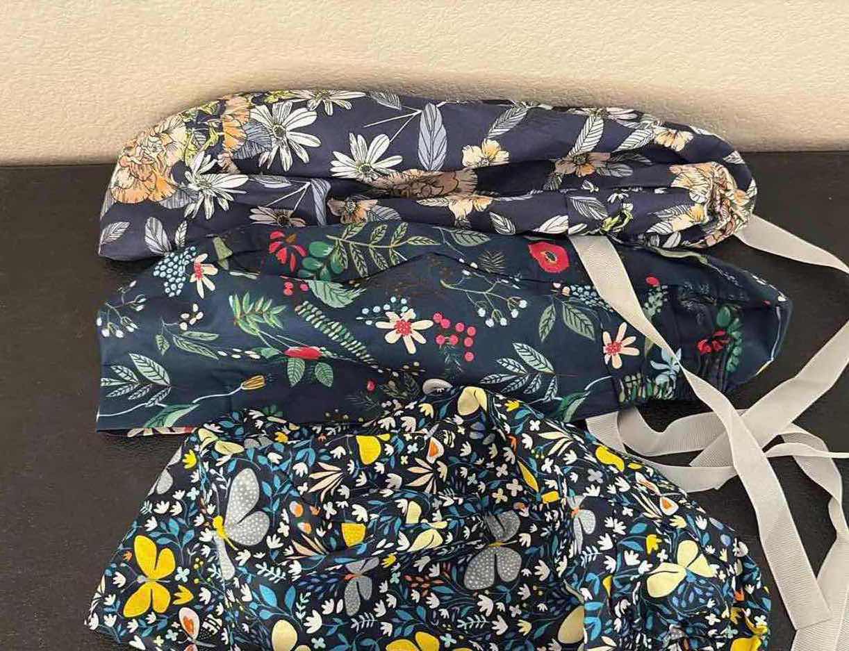 Photo 1 of WOMENS NEW SCRUB CAPS