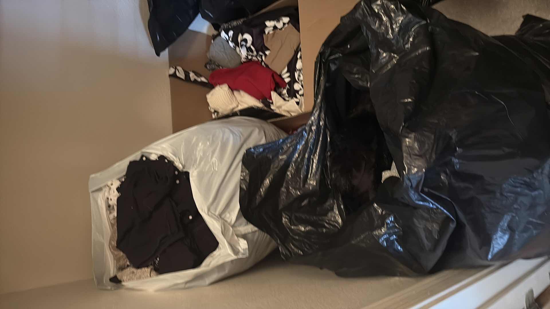 Photo 1 of CLOSET OF WOMENS USED CLOTHING SIZES AND MEDIUM , LARGE AND EXTRA LARGE