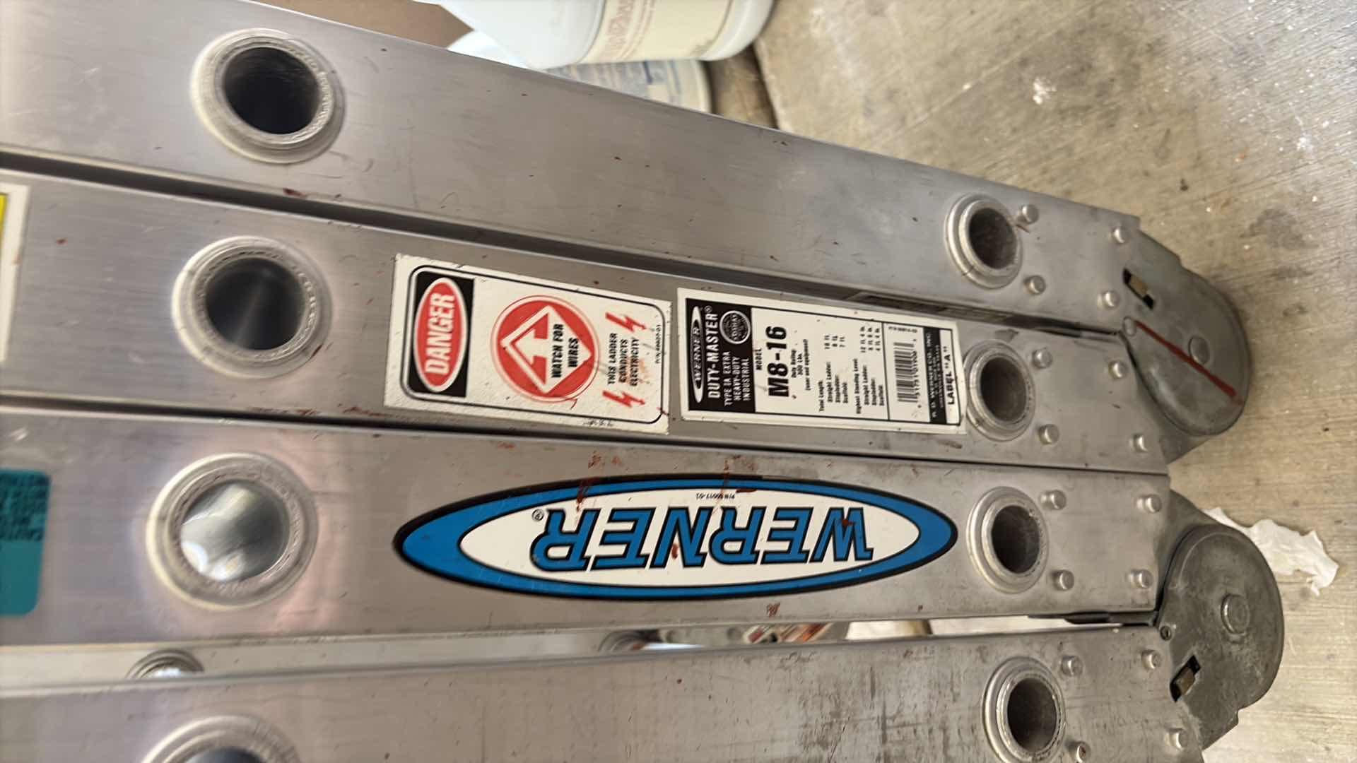 Photo 1 of WERNER HEAVY DUTY INDUSTRIAL 12 FOOT LADDER