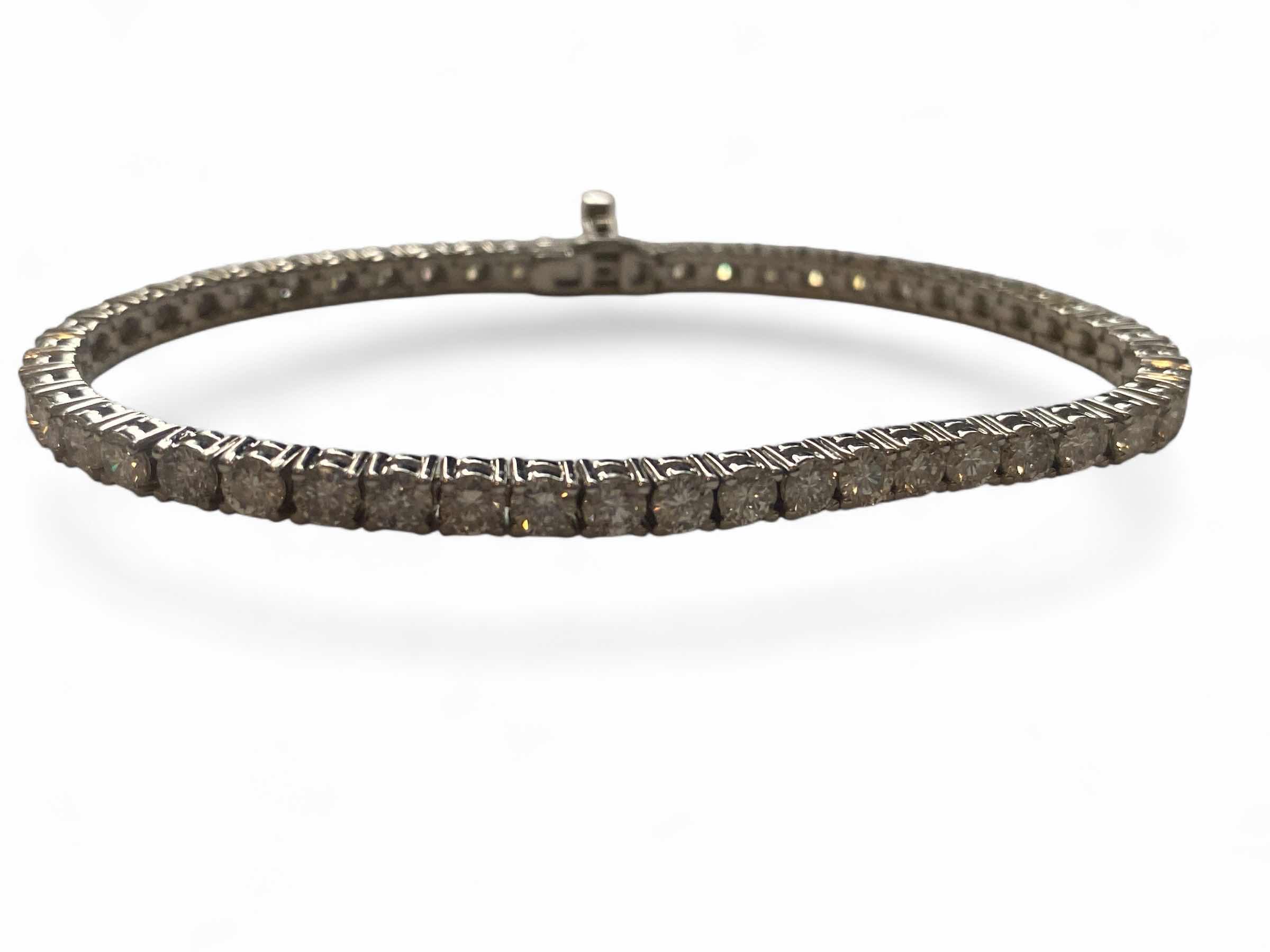 Photo 1 of 14K WHITE GOLD. W 7.5cwt DIAMOND TENNIS BRACELET 12.5 TTL G  #5 EST VALUE $40,250