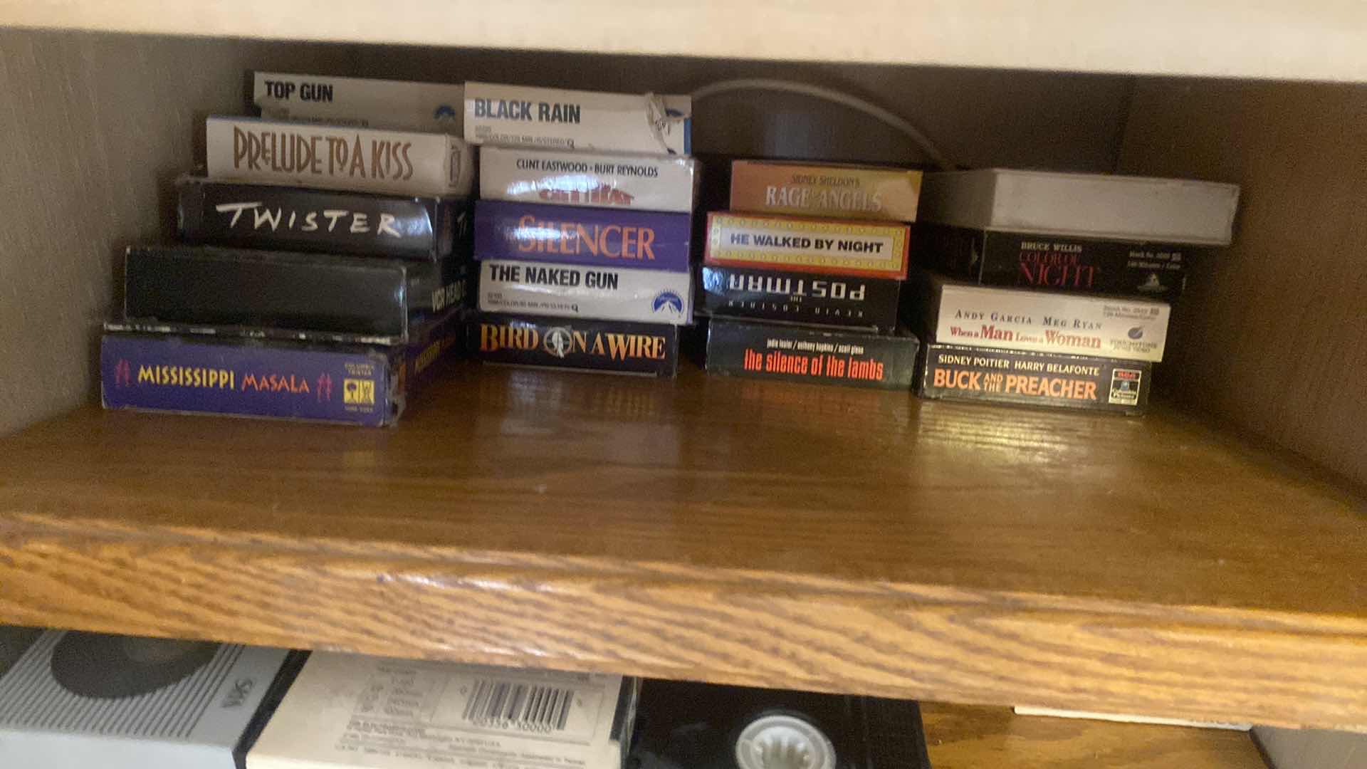 Photo 1 of VHS MOVIES - ENTERTAINMENT CENTER SOLD SEPARATELY