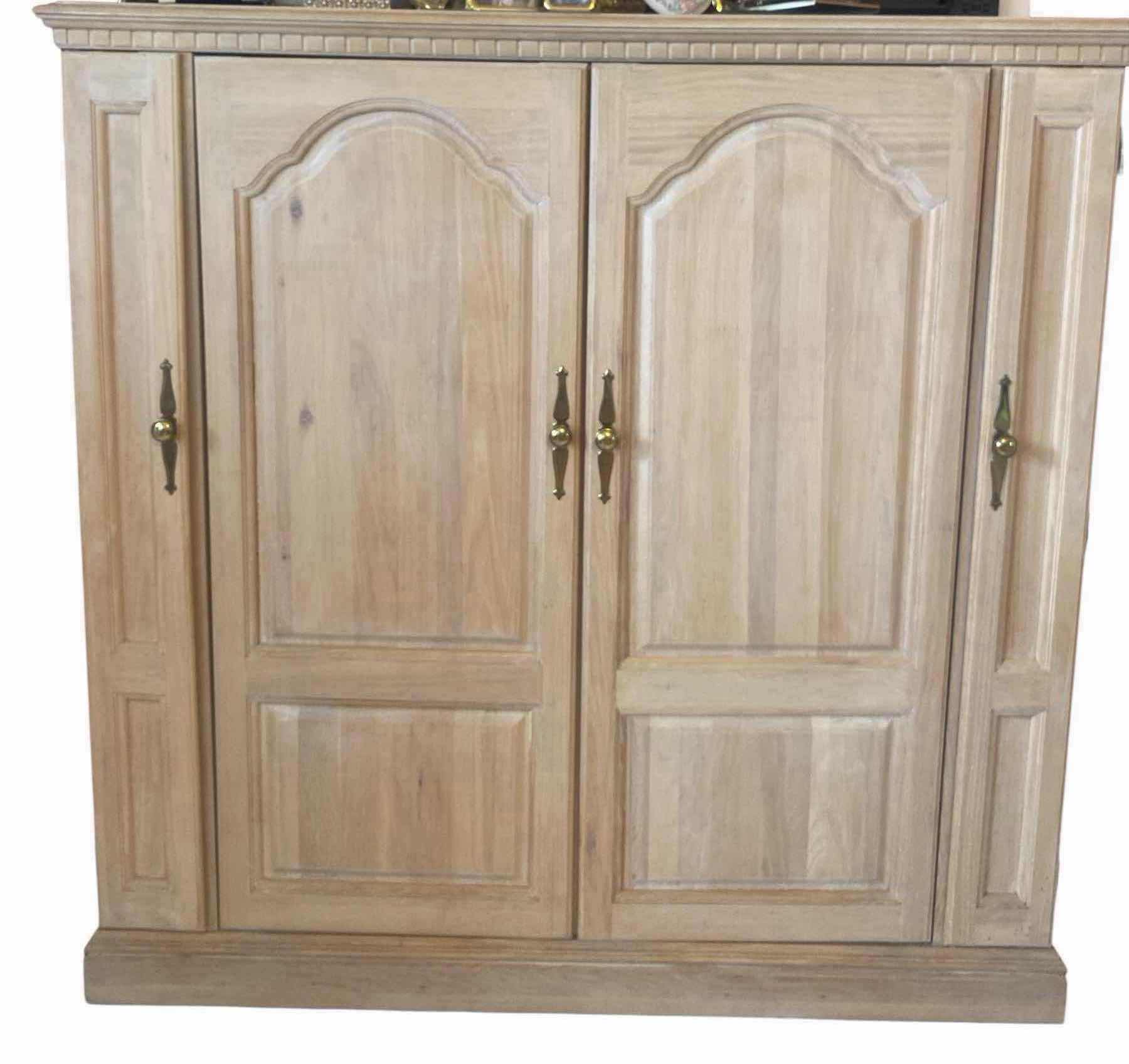 Photo 1 of LIGHT WOOD ENTERTAINMENT CENTER 58” x 24 1/2” H 58”