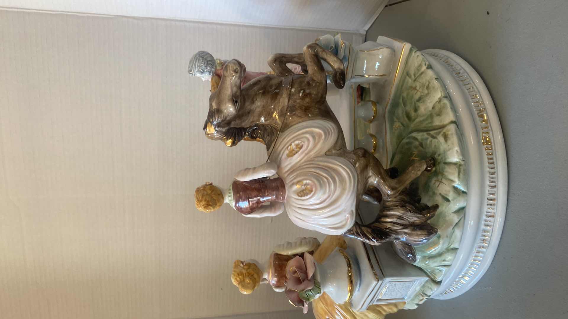 Photo 1 of LARGE PORCELAIN FIGURINES ON LANDING WITH HORSE MADE IN ITALY 17” x 14”