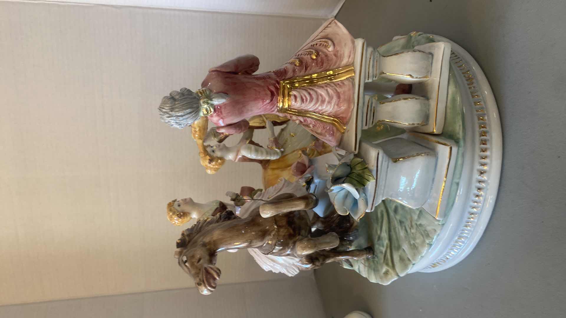 Photo 1 of LARGE PORCELAIN FIGURINES ON LANDING WITH HORSE MADE IN ITALY 17” x 14”