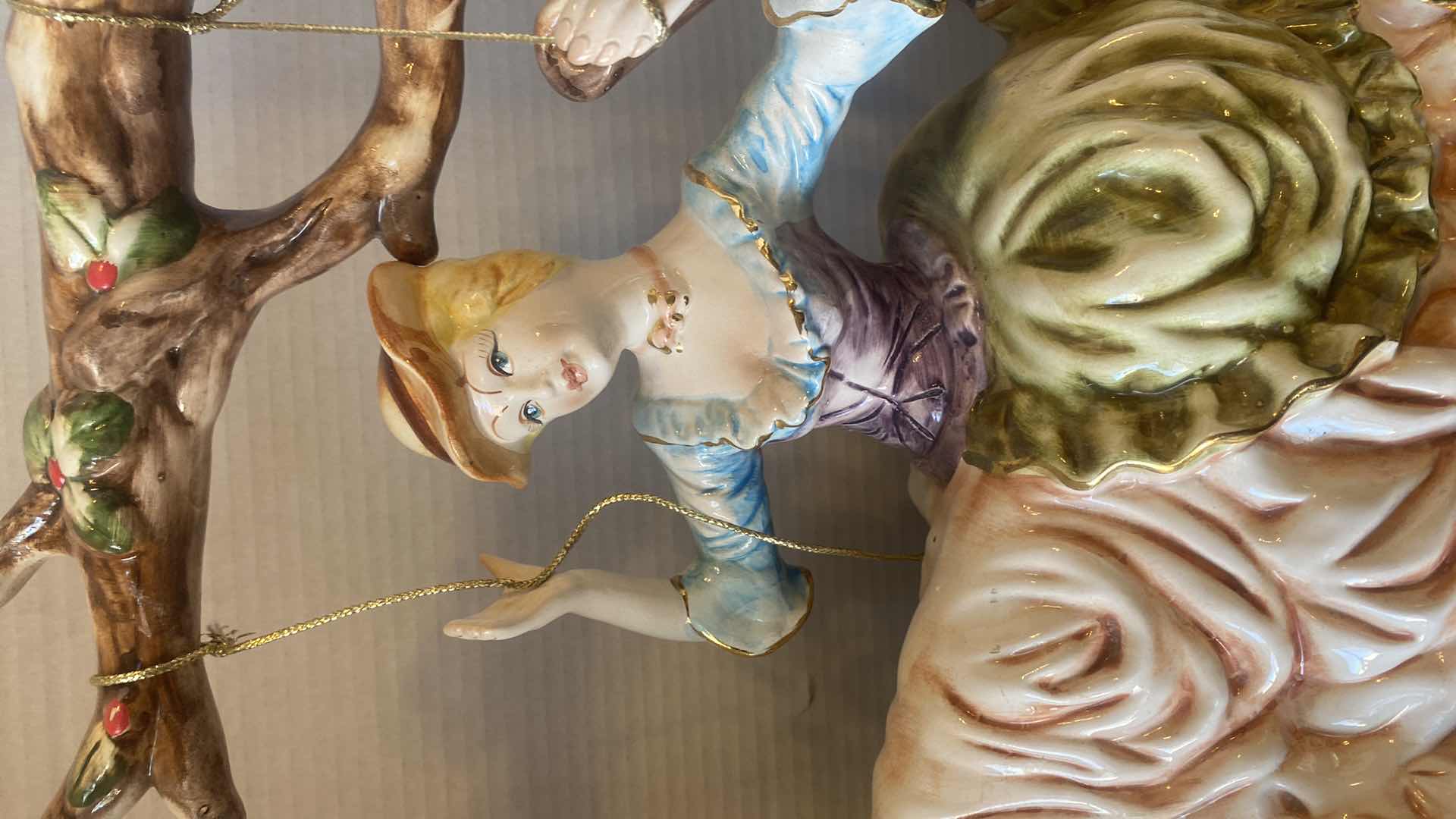 Photo 1 of LARGE CAPIDOMONTE WOMAN ON SWING 18” x 17 1/2”