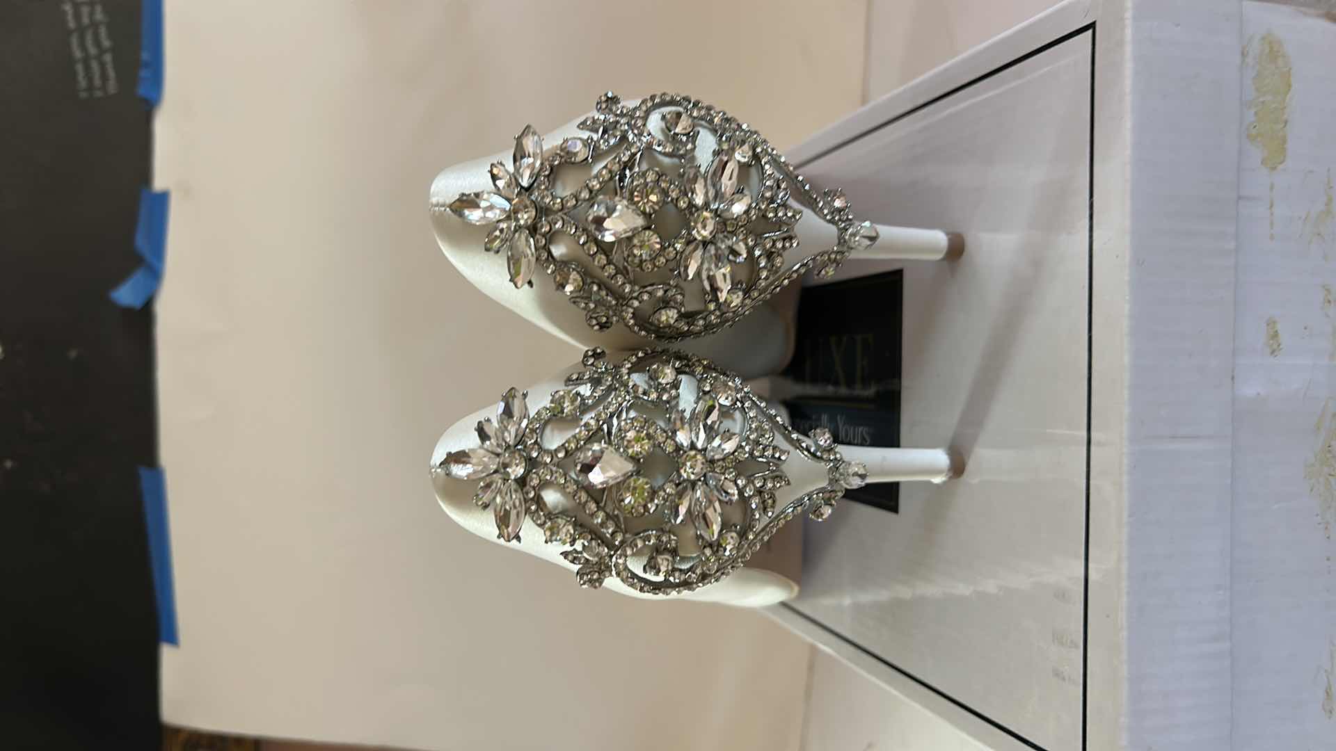 Photo 1 of NEW WOMENS WHT HEELS SIZE 10