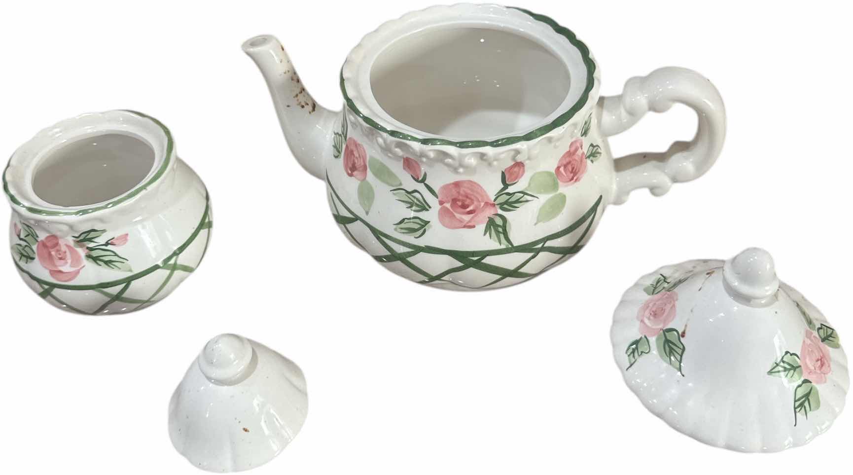 Photo 1 of 2- VINTAGE CERAMIC TEAPOT AND SUGAR BOWL WITH LID PINK ROSES AND LEAVES DESIGN
TEAPOT 
H6.5”