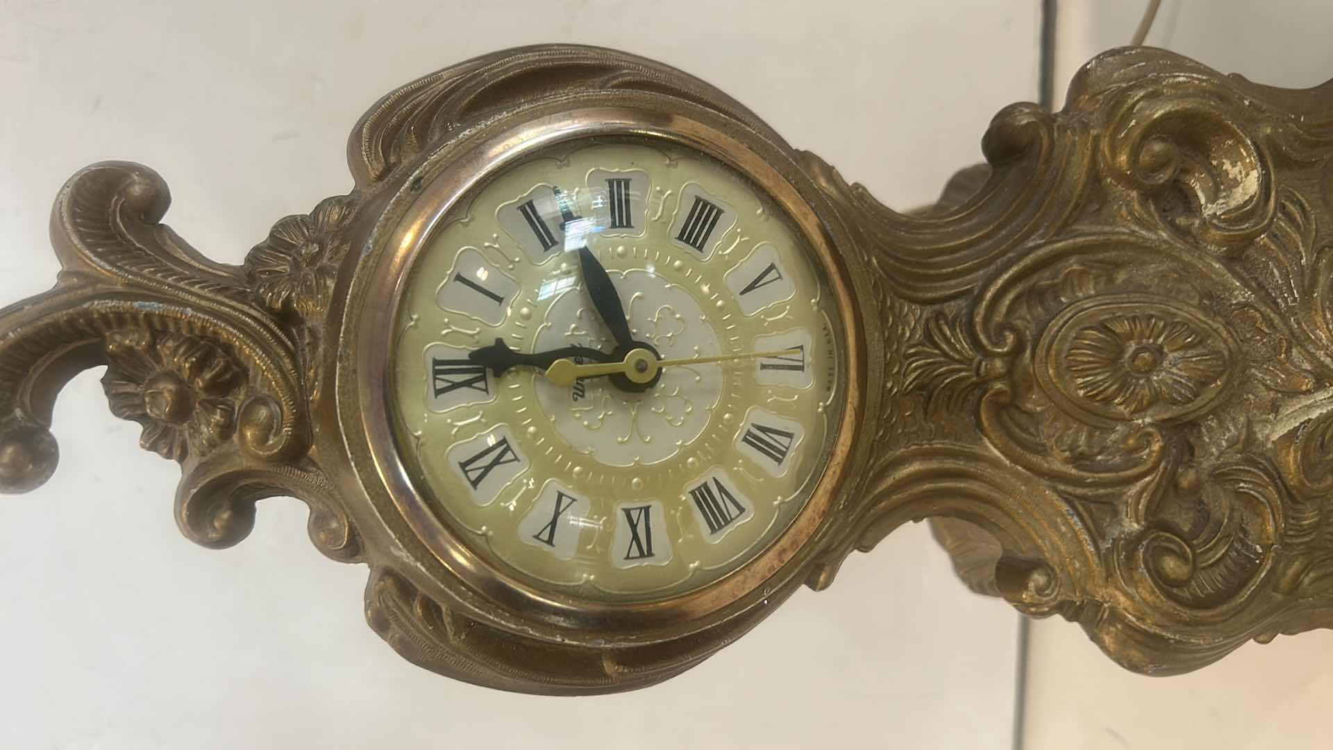 Photo 1 of VINTAGE GOLD TONE CLOCK H12.25”