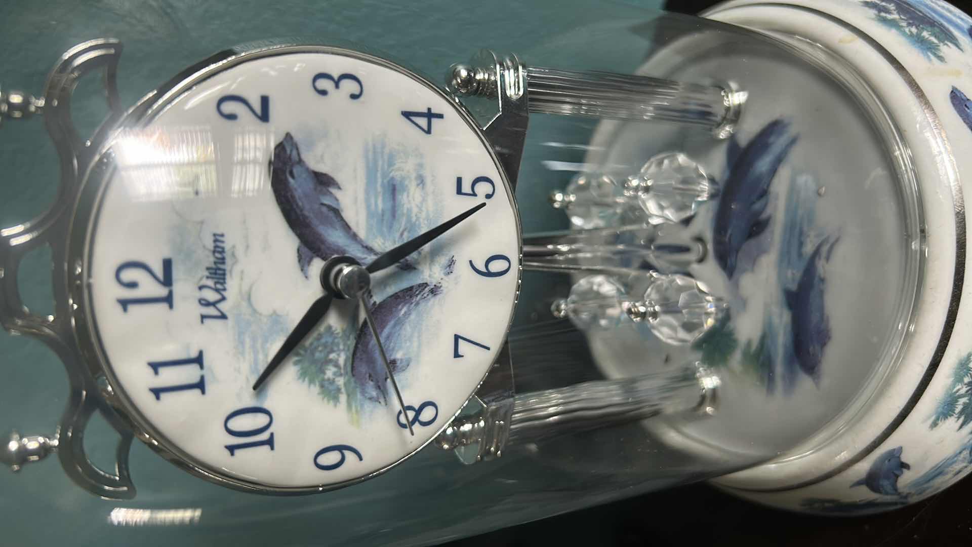 Photo 1 of WALTHAM ANNIVERSARY CLOCK W DOLPHIN THEME H 11"