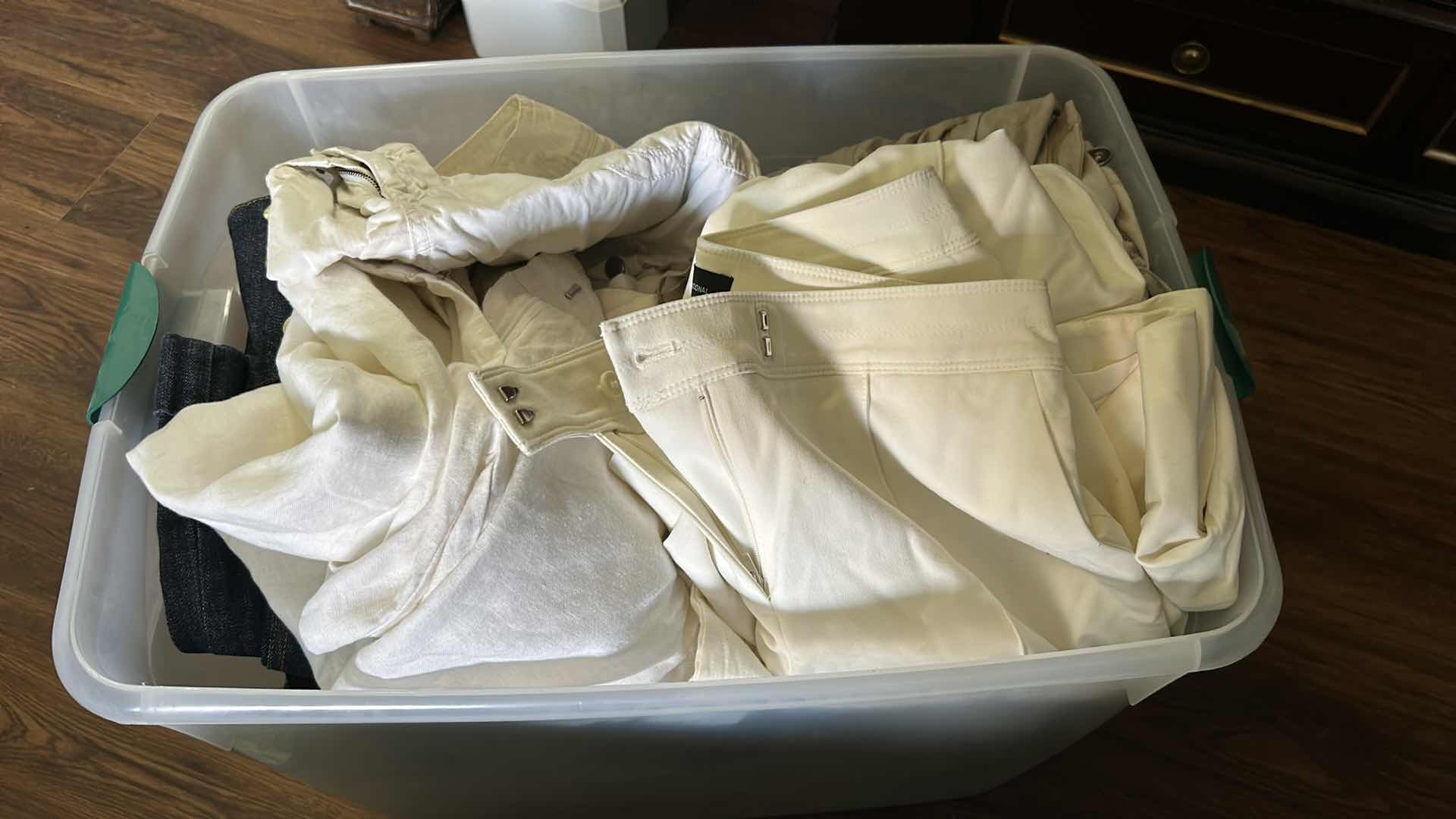 Photo 1 of CONTENTS OF PLASTIC CONTAINER ASSORTED WOMENS PANTS SIZE 6,8,10