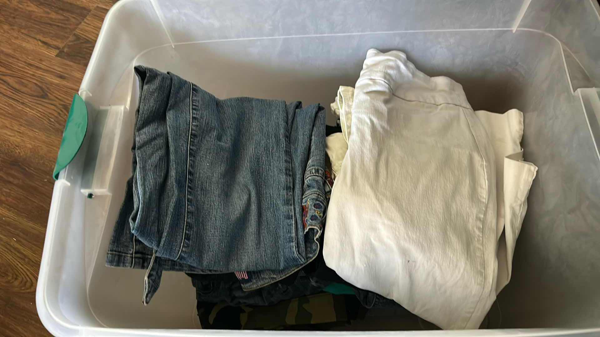 Photo 1 of CONTENTS OF PLASTIC CONTAINER ASSORTED WOMENS PANTS SIZE 6,8,10