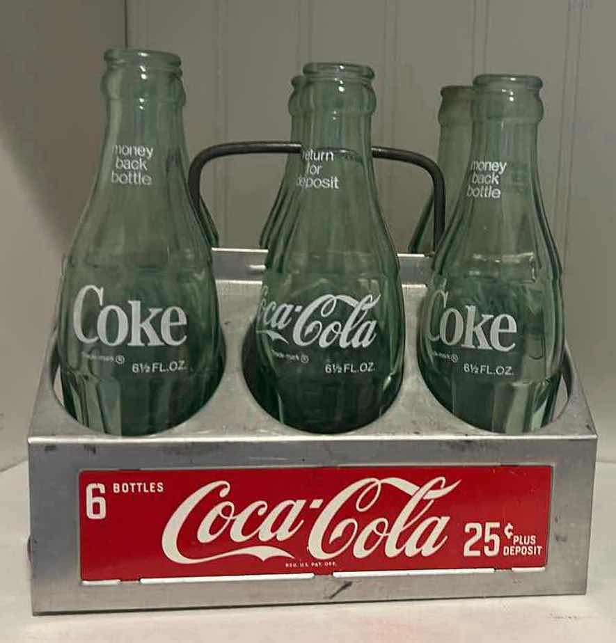 Photo 1 of VINTAGE COCA- COLA SIX PACK BOTTLE CARRIER w 7 BOTTLES