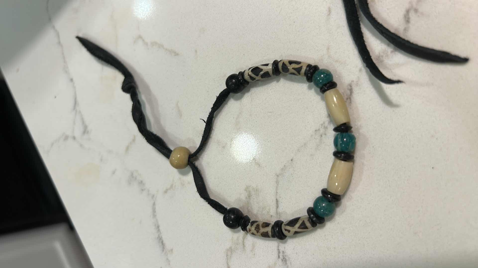 Photo 1 of JEWELRY- 3 BEADED LEATHER BRACELETS