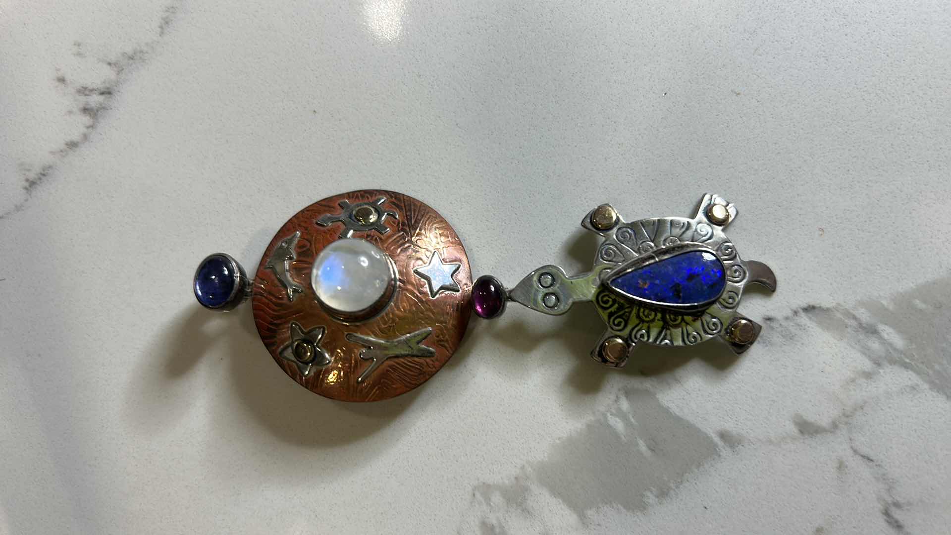 Photo 1 of 2 WESTERN JEWELRY PIECES - MIXED METAL PENDANT WITH COPPER AND STERLING SILVER, SEMI PRECIOUS STONES, AND BRACELET