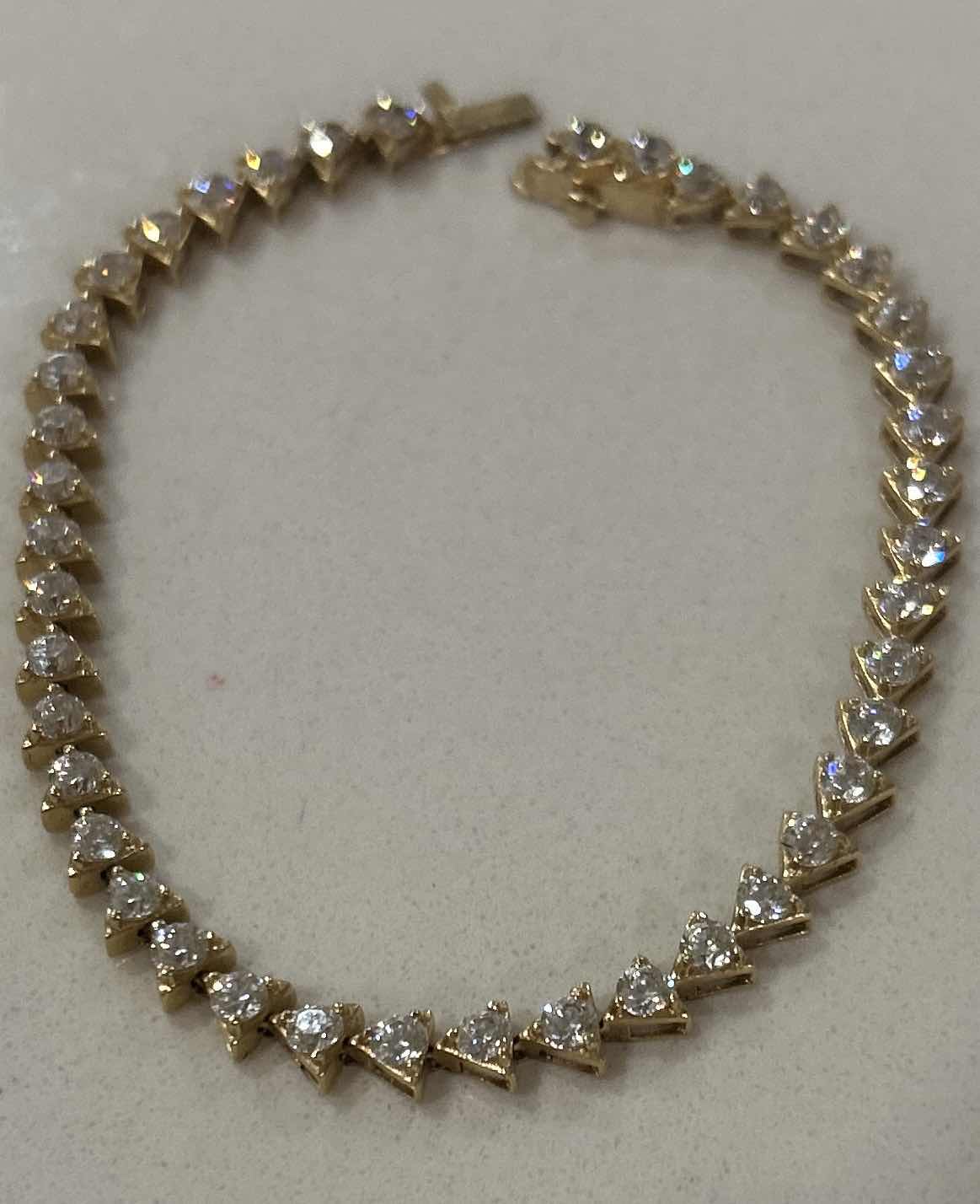 Photo 1 of 7.5” 14K YELLOW GOLD TENNIS BRACELET WITH CZ STONES