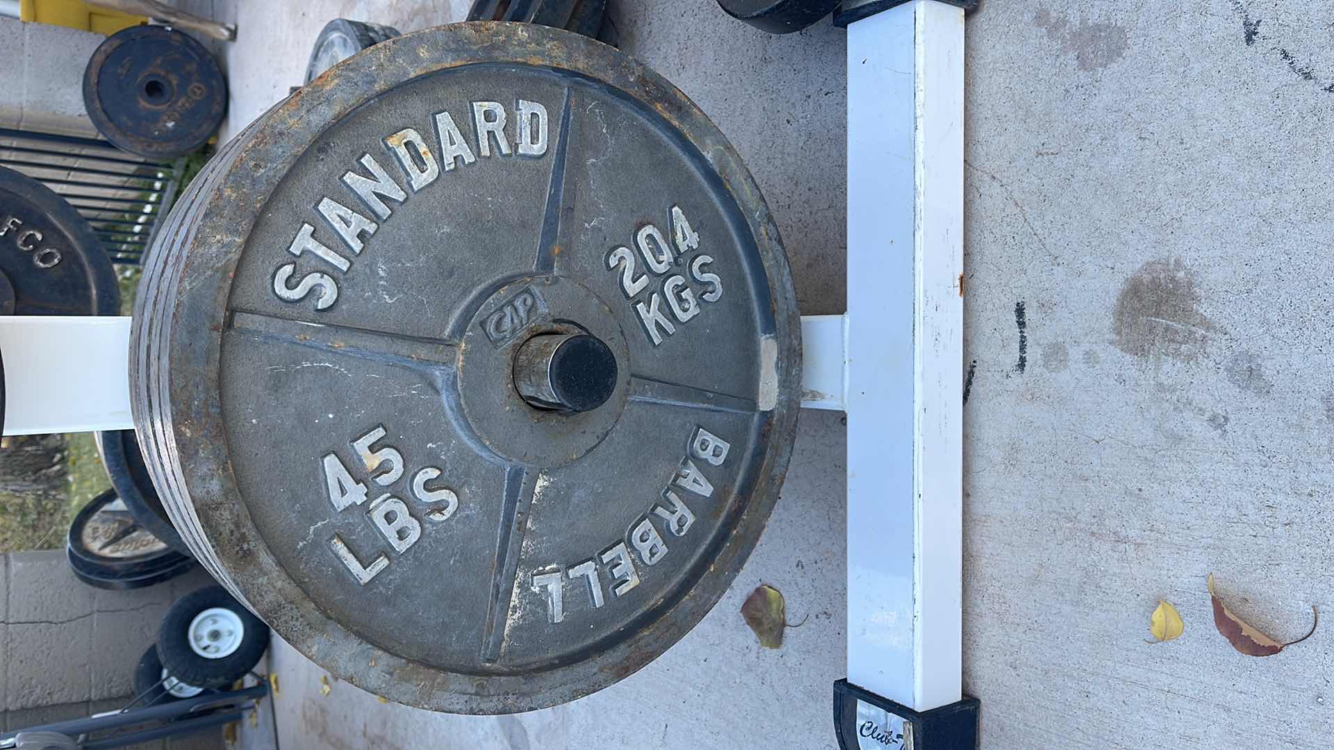 Photo 2 of 1 STANDARD 45LBS BARBELL WEIGHTS