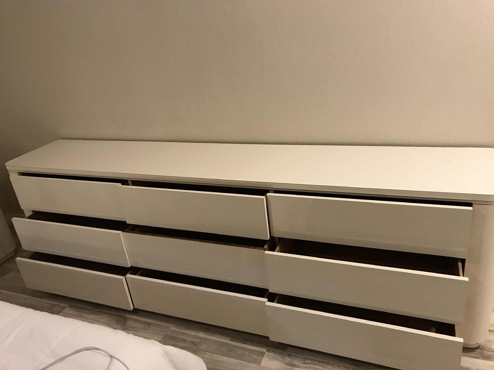 Photo 1 of POSTMODERN WATERFALL LAMINATED LACQUERED 
9 DRAWER DRESSER 
102 X 18 X 30
MORE OF THIS COLLECTION IN AUCTION